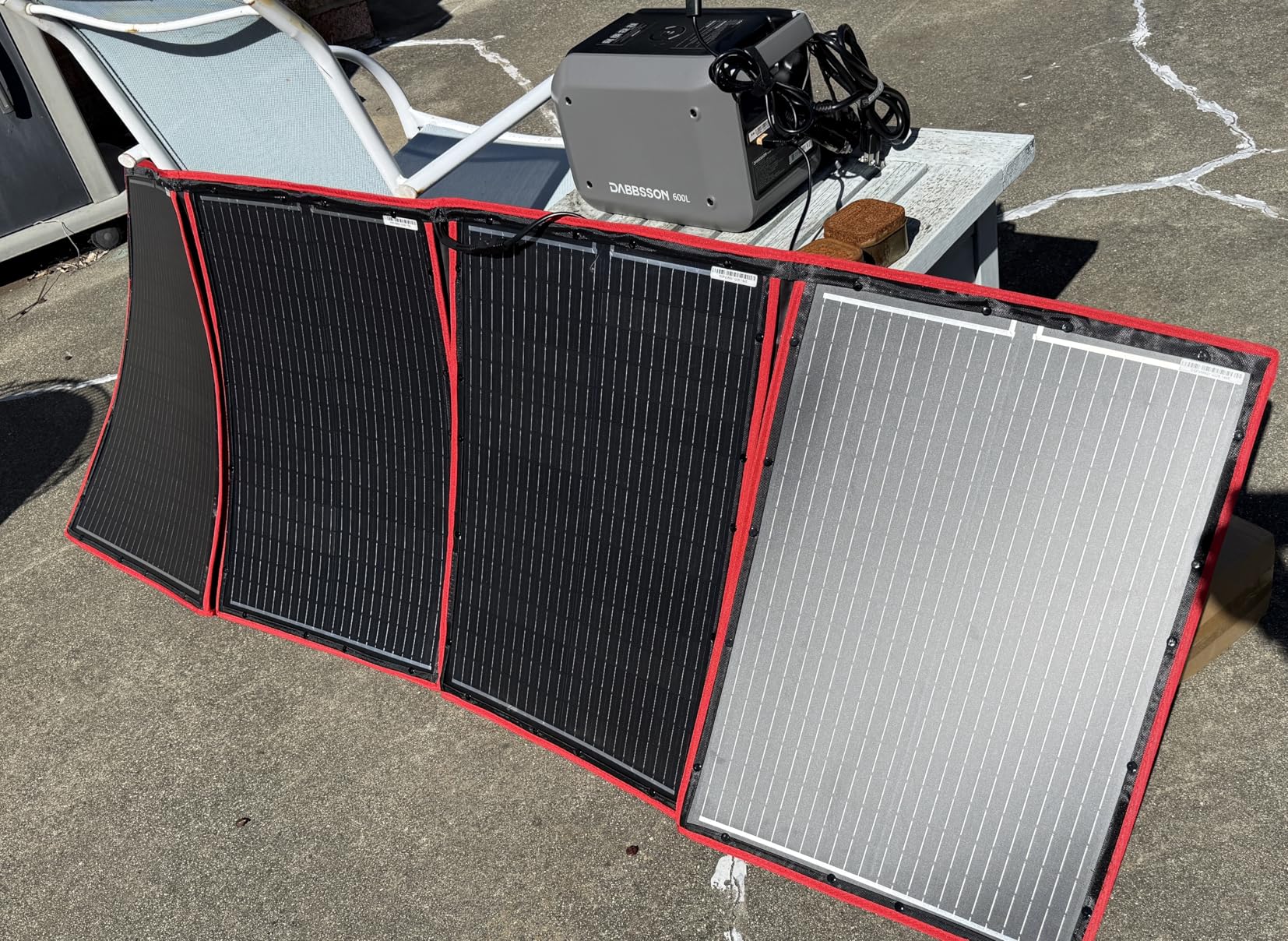 DOKIO 100W Portable Foldable Solar Panel Kit (19x26in, 5.3lb), with Separate Controller and Dual USB, Monocrystalline Charger for 12V Batteries & Power Stations, RV Camping Trailer Emergency Backup customer photo 1
