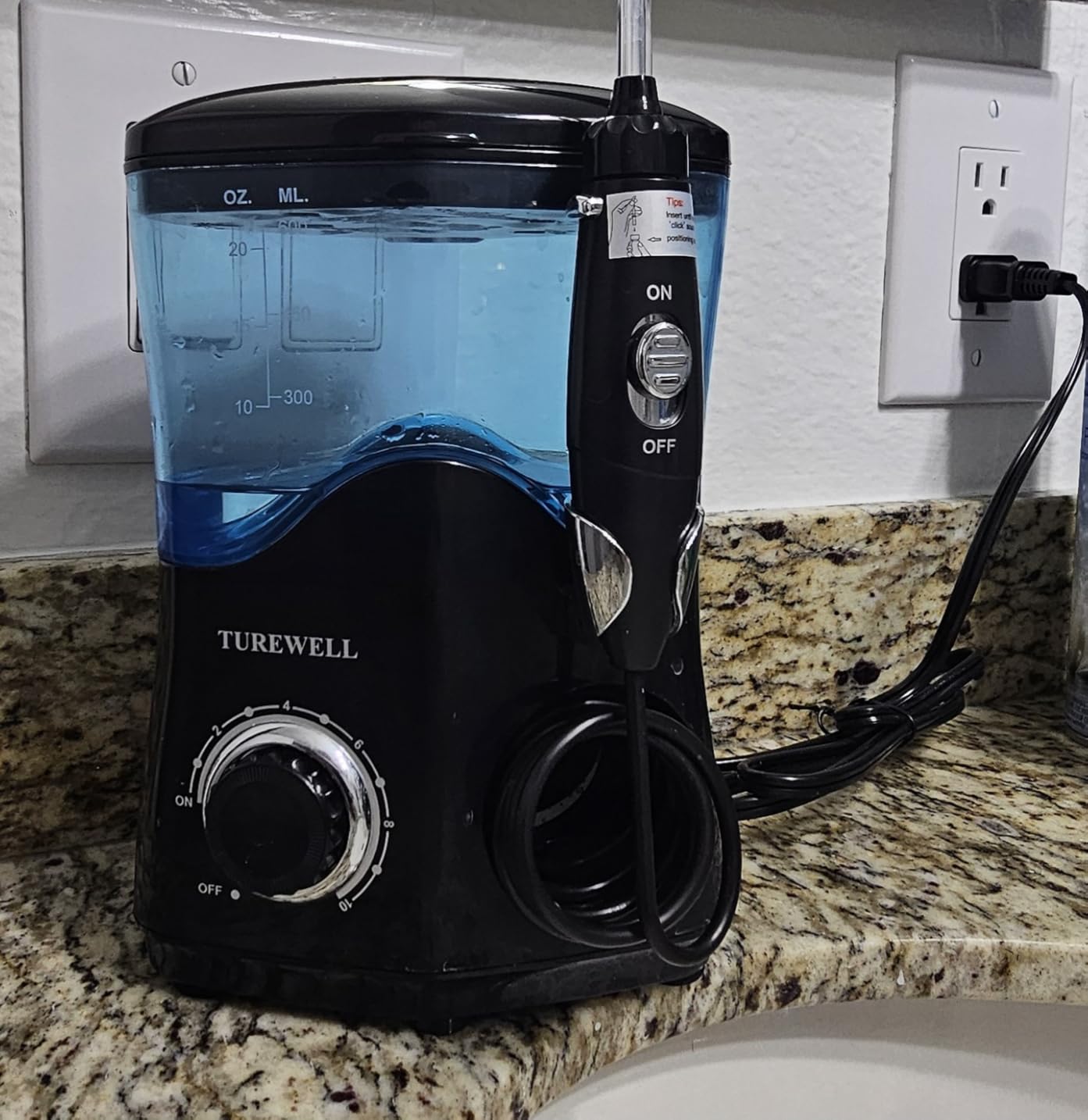 TUREWELL FC162 Water Dental Flosser for Teeth/Braces, 10 Pressure Levels, 8 Water Jet Tips for Family, 600ML Electric Water Dental Oral Irrigator for Teeth-Clean (Black) customer photo 1
