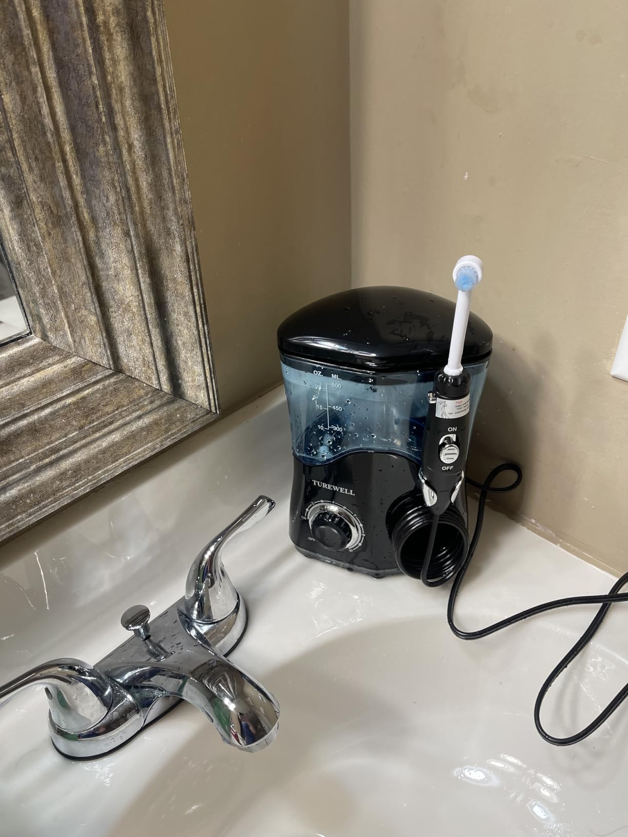 TUREWELL FC162 Water Dental Flosser for Teeth/Braces, 10 Pressure Levels, 8 Water Jet Tips for Family, 600ML Electric Water Dental Oral Irrigator for Teeth-Clean (Black) customer photo 2