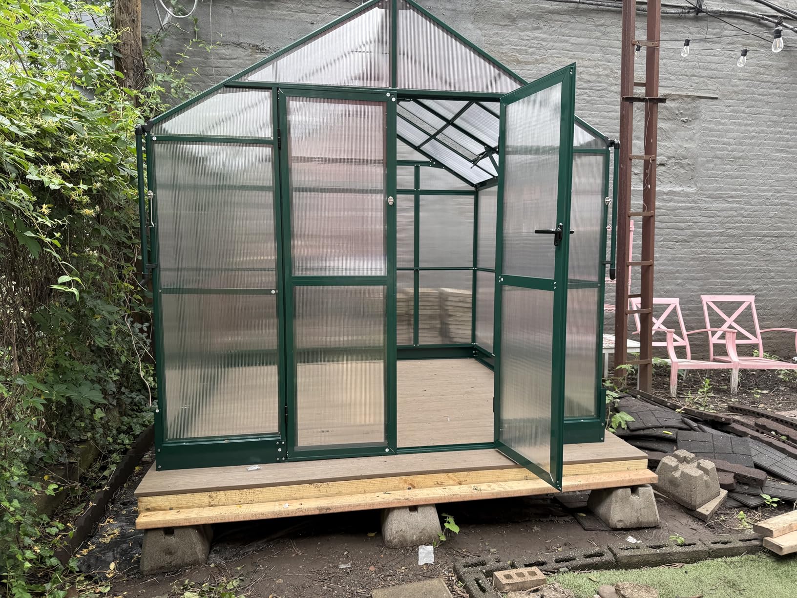 HOWE 8x10x7.5 FT Polycarbonate Greenhouse Double Swing Doors 2 Vents 5.2FT Added Wall Height, Walk-in Large Aluminum Sunroom Winter Greenhouse for Outdoors, Black customer photo 1