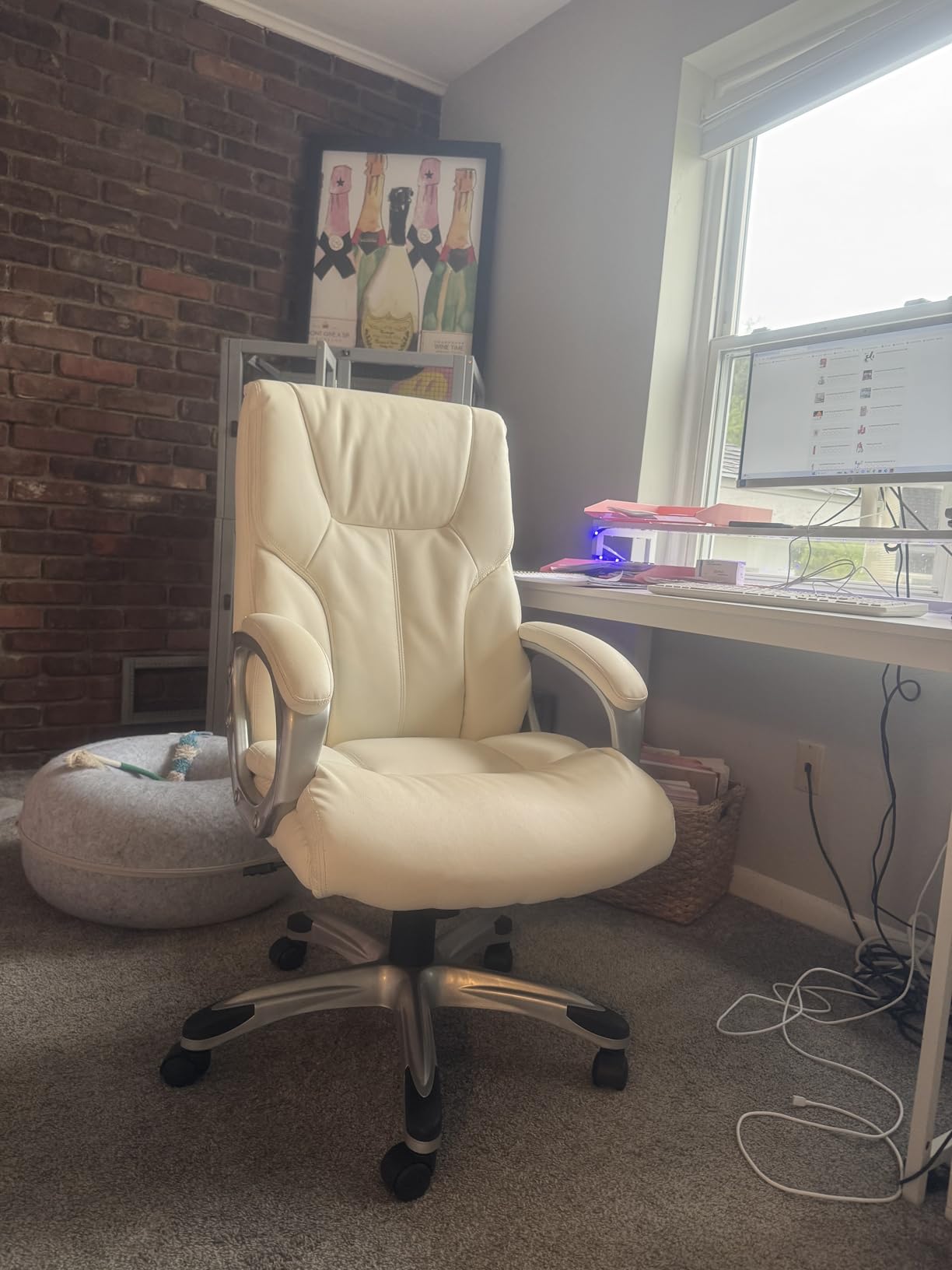Amazon Basics Executive High Back Office Chair, Adjustable Height, Tilt, Swivel, Padded Seat, Bonded Leather, Wheels, Black/Silver customer photo 1