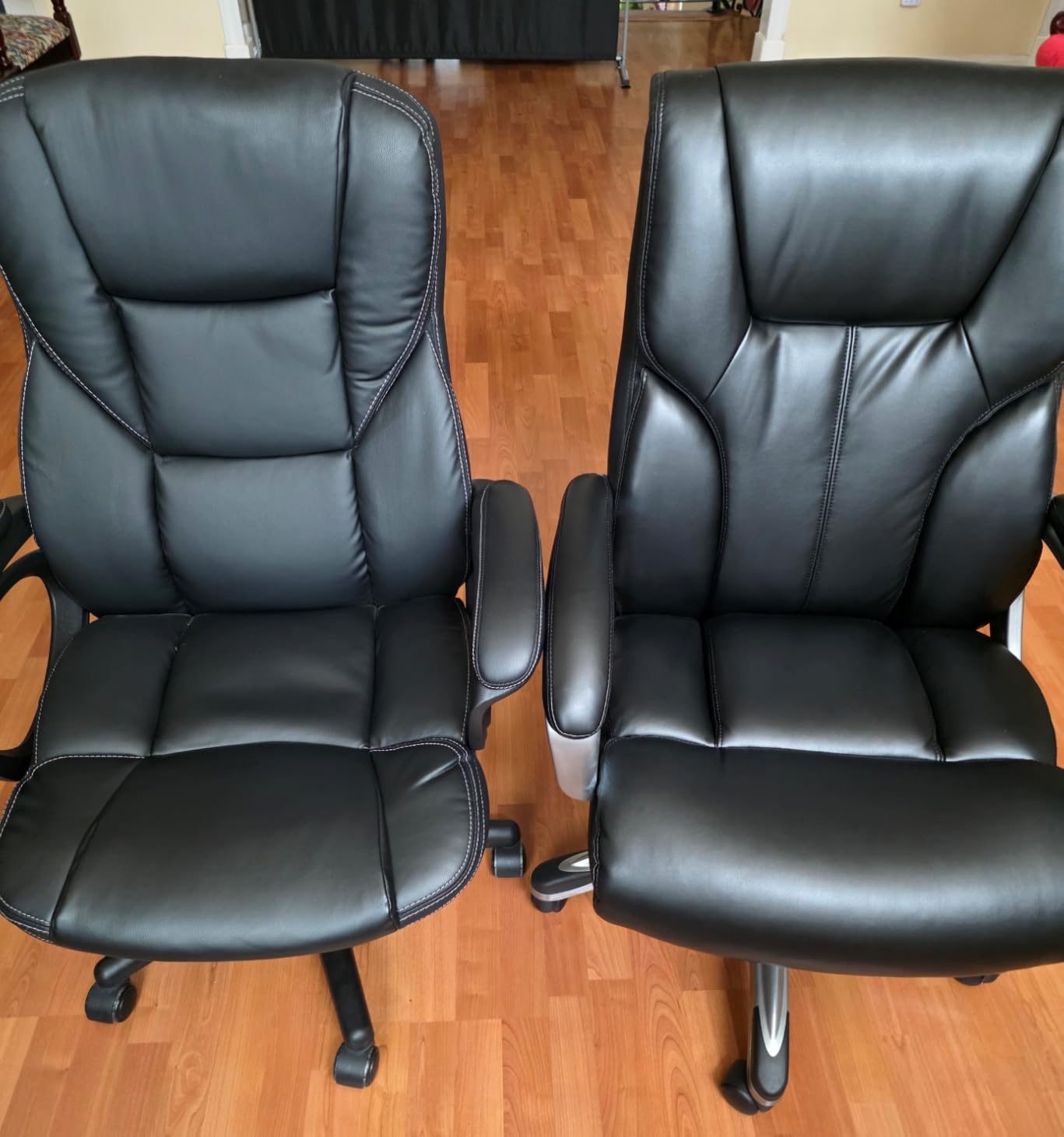 Amazon Basics Executive High Back Office Chair, Adjustable Height, Tilt, Swivel, Padded Seat, Bonded Leather, Wheels, Black/Silver customer photo 2