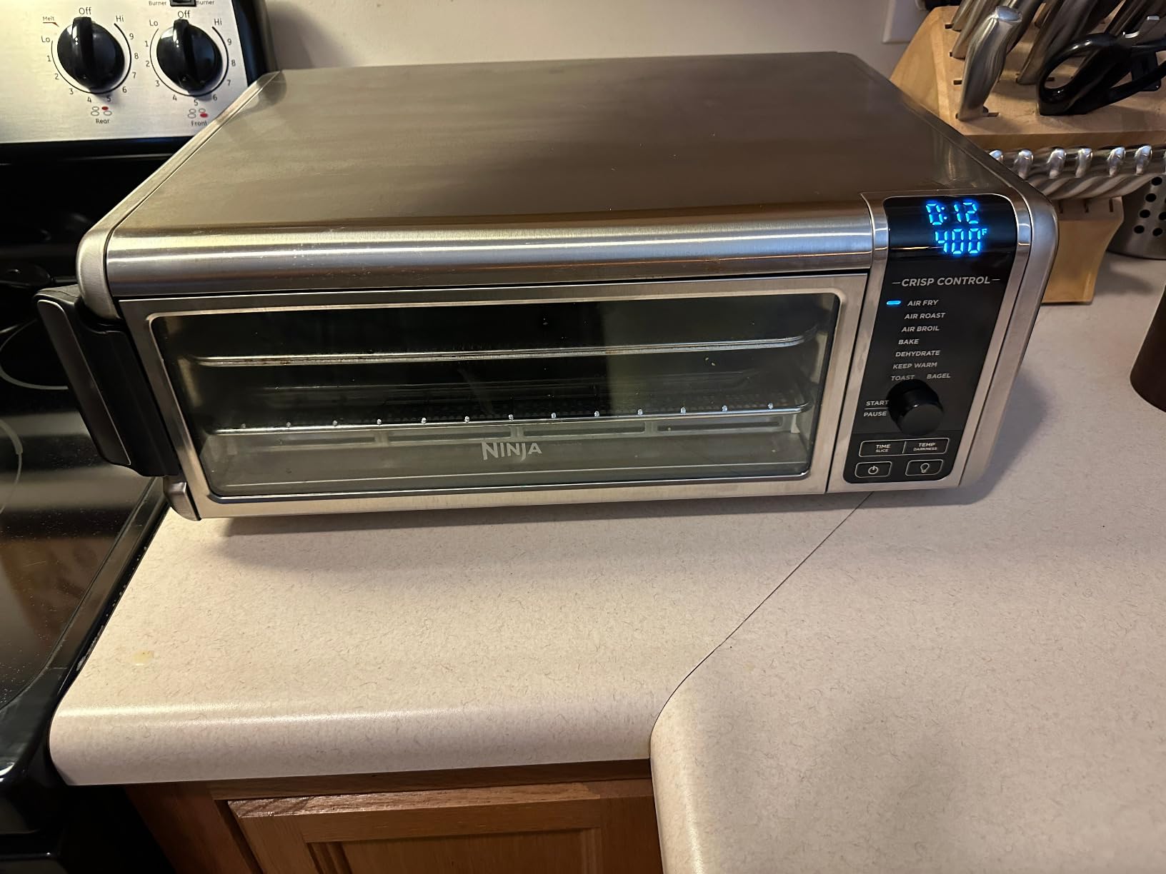 Ninja Air Fryer Toaster Oven Combo | 8-in-1 Functionality | Flip Up & Away for Storage Space | Air Fry Basket, Sheet Pan, Wire Rack & Removable Crumb Tray | 1800 Watt | Stainless Steel | SP151 customer photo 2