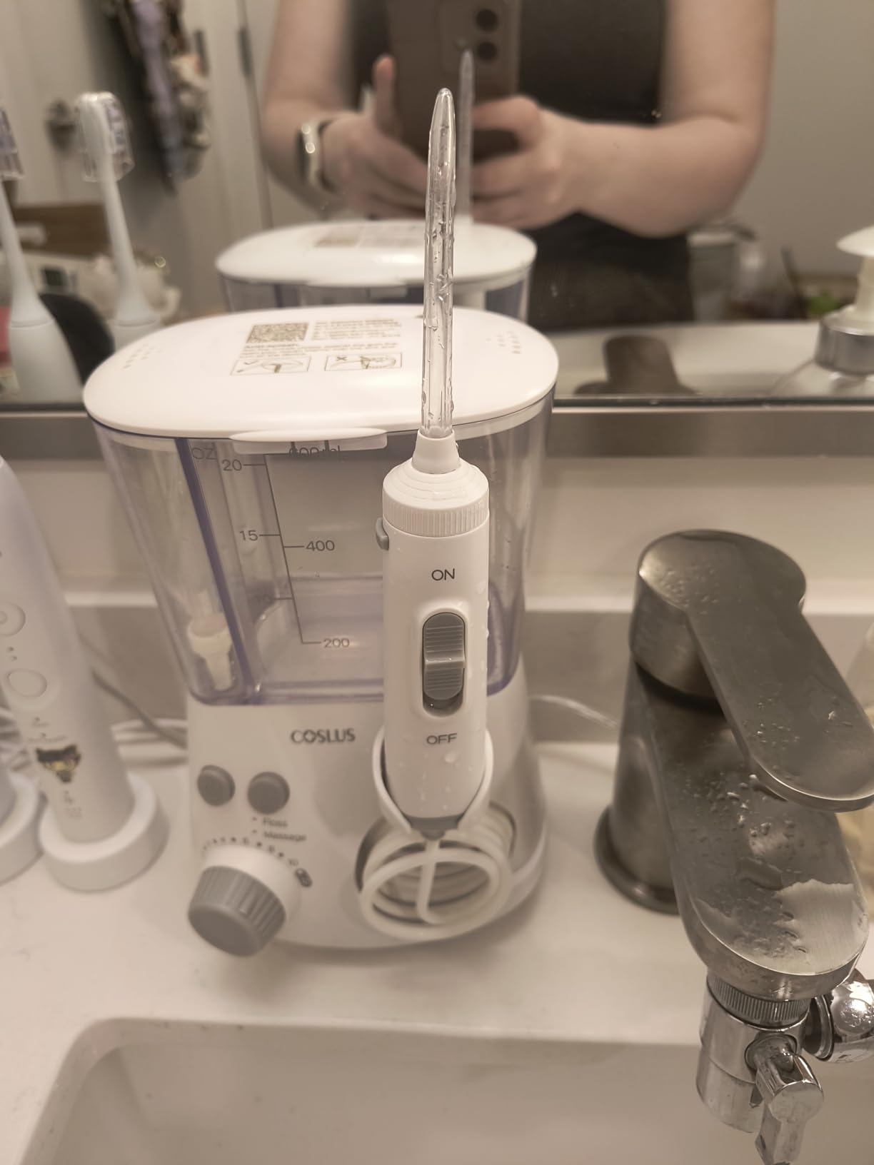 COSLUS E2 Advanced Water Flosser for Teeth: 2 Modes & 12 Pressure Settings Electric Dental Pick for Orthodontic, Braces, Sensitive Gums - Home Use, 5 Jet Tips for Multiple Users, Family, White customer photo 1