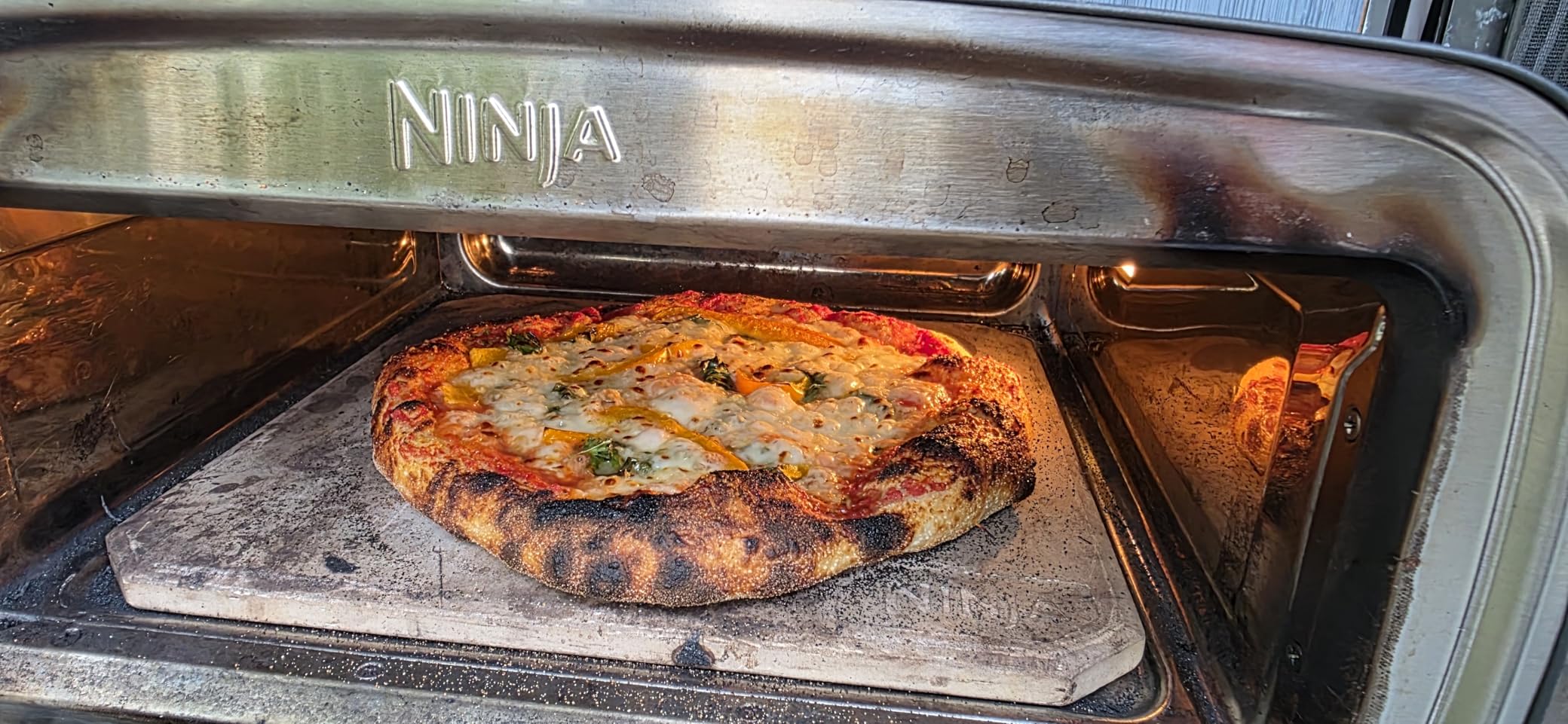 Ninja Artisan Electric Outdoor Pizza Oven with Stone | 12-inch Pizza in 3-minutes | 700F Max Temp | 5-in-1 Functionality - Pizza, Bake, Broil, Proof & Warm | Makes Full Meals | Gray | MO201 customer photo 2