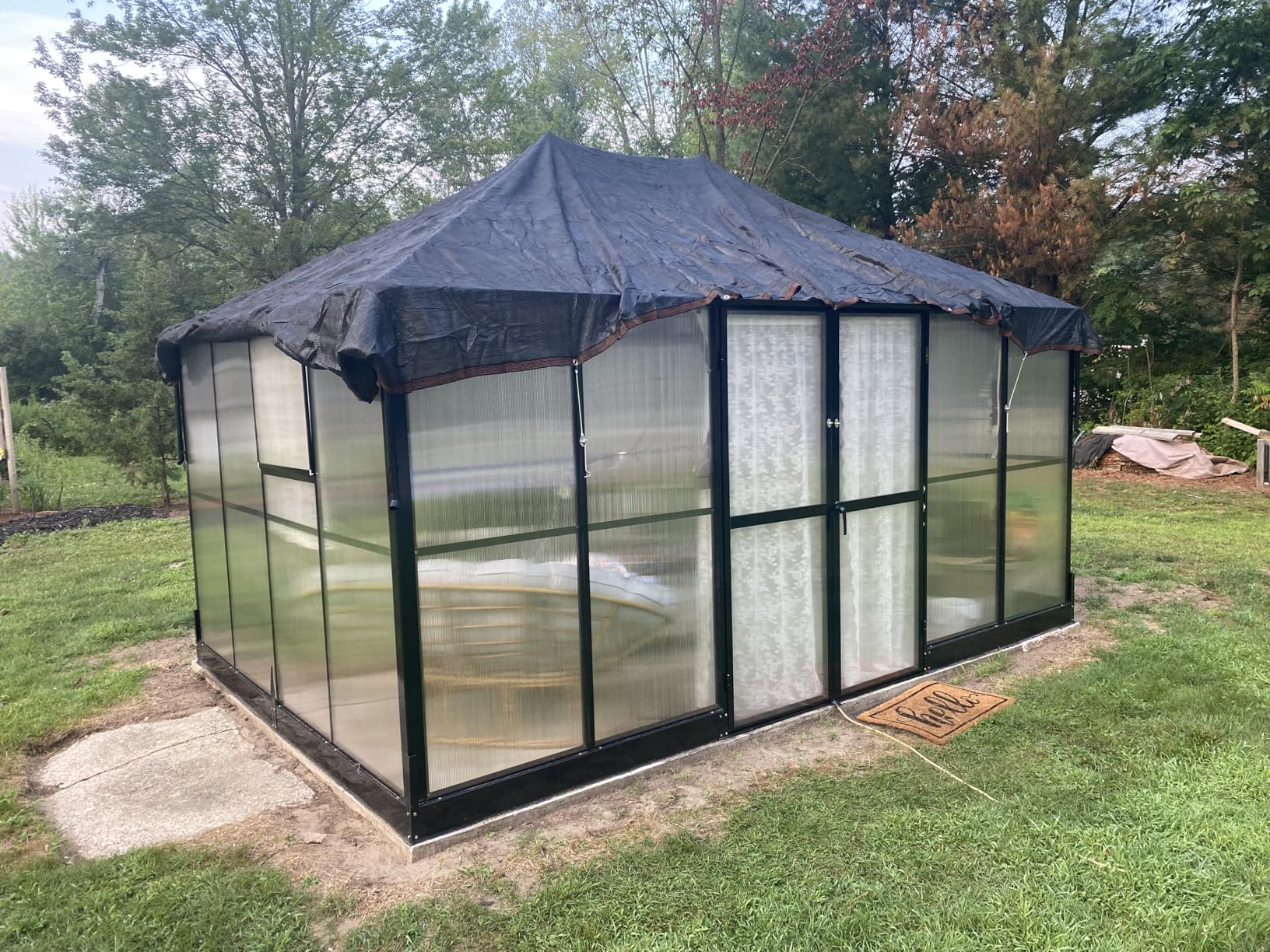 HOWE 16x12x9.5 FT Polycarbonate Greenhouse for Outdoors, Pavilion Style Greenhouse with 4 Vent Windows, Lockable Double Doors, Ideal for Garden & Patio Use, Black customer photo 1