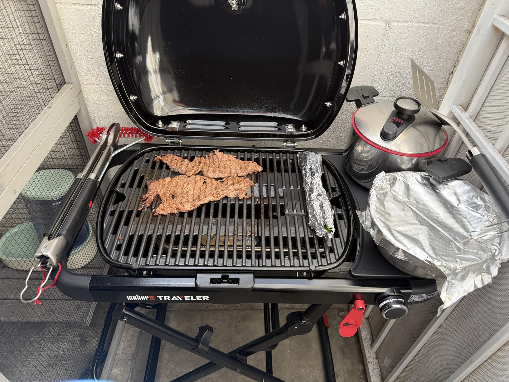 Weber Traveler Compact Portable Gas Grill (Liquid Propane) for Outdoor Cooking - Black, Porcelain-Enameled Lid, Side Table, Folding Portable Grill with Wheels for Camping, Tailgating & Travel customer photo 2