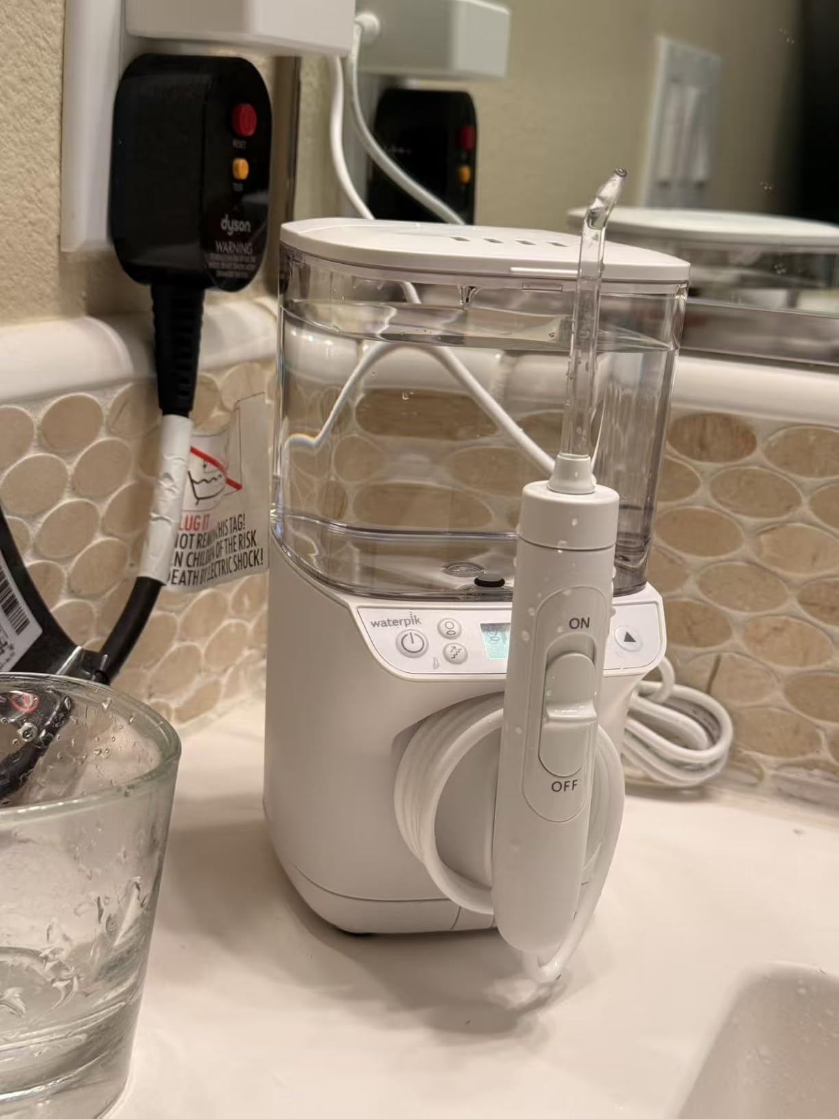 Waterpik Promax Water Flosser with SmartAdvance Mode for Daily Gum Health and Cleaning Teeth, Braces, Implants, ADA Accepted, Small Quiet Design, Electric Flosser with 10 Settings, 5 Tips, WF-23 customer photo 2