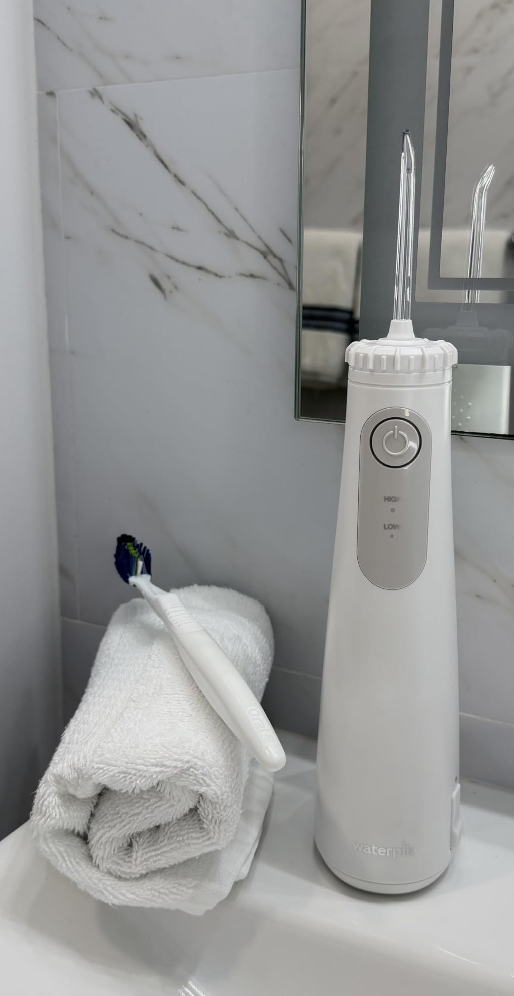 Waterpik Cordless Gem Water Flosser 5100 for Travel and Home, Rechargeable, Portable, Waterproof for Shower, Daily Gum Care, Cleaning Teeth, Braces, Implants, 3 Flossing Tips, ADA Accepted White WF-27 customer photo 1