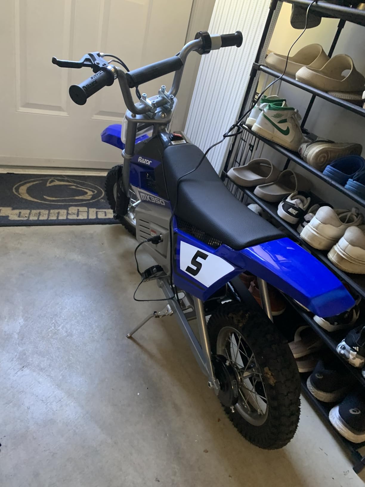 Razor MX350 Dirt Rocket Electric Bike for Kids Ages 8+, 140 lb Max Weight, Blue - 24V Battery, Up to 14 Mph, 30-Min Ride Time on High Speed, Twist-Grip Throttle, Spoked Wheels w/ 12 Pneumatic Tires customer photo 1