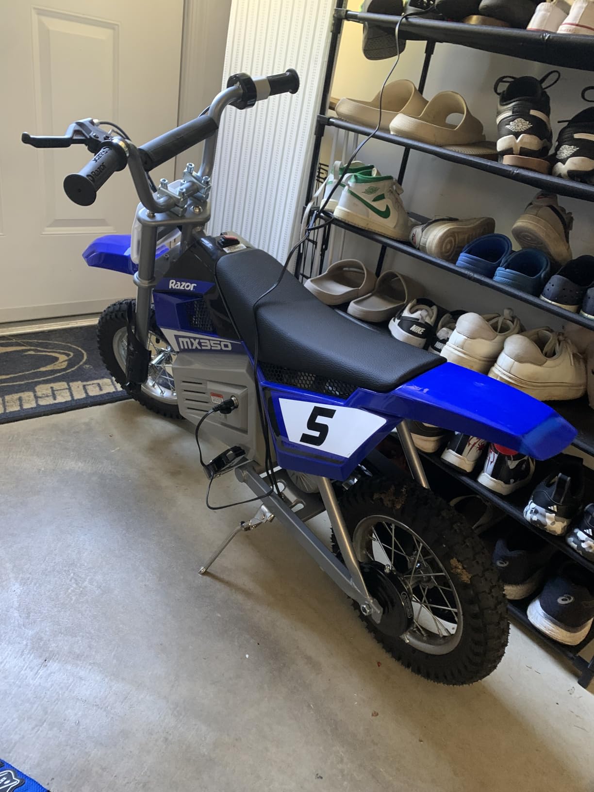 Razor MX350 Dirt Rocket Electric Bike for Kids Ages 8+, 140 lb Max Weight, Blue - 24V Battery, Up to 14 Mph, 30-Min Ride Time on High Speed, Twist-Grip Throttle, Spoked Wheels w/ 12 Pneumatic Tires customer photo 2