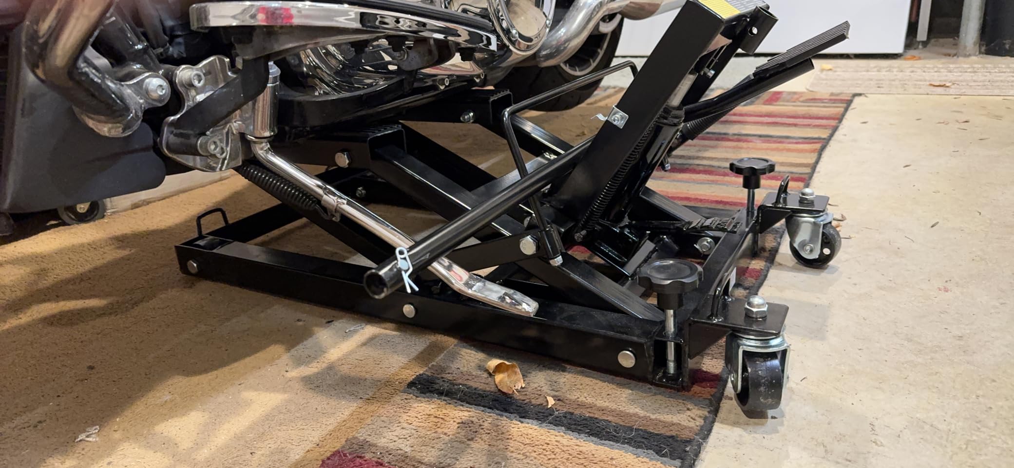 Black Widow Hydraulic Steel Motorcycle and ATV Lift Jack Stand, 1,500 lb | Foot-Pedal Hydraulic Lifts 5.25 to 15.75 In, 3-Position Safety Locks, Rubber Saddle Pads and Tie-Down Loops, Swivel Casters customer photo 2