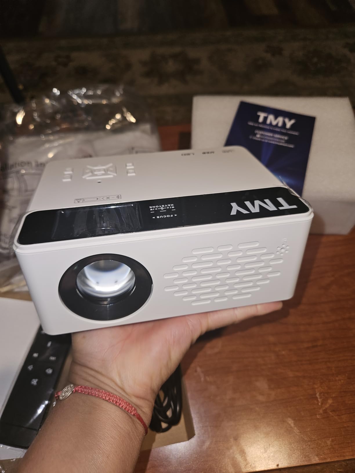 TMY 1080P Full HD Portable Mini Projector, Bluetooth Movie Projector with Projector Screen customer photo 1