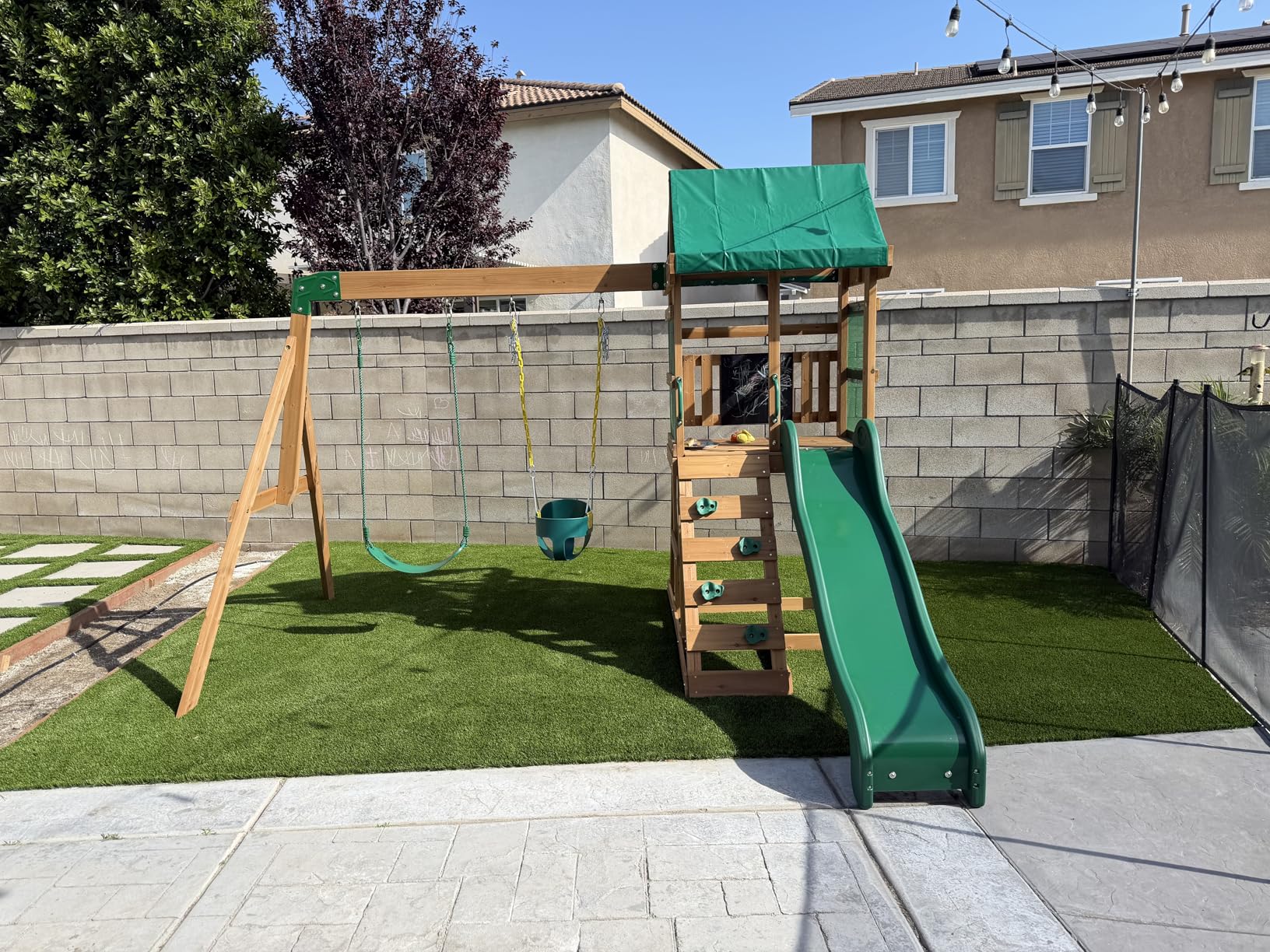 Backyard Discovery Bay Pointe Cedar Wood Swing Set with Wave Slide, Play Deck, Rock Wall Ladder, Belt Swings, Chalkboard, Canopy Roof, Outdoor Playset customer photo 2