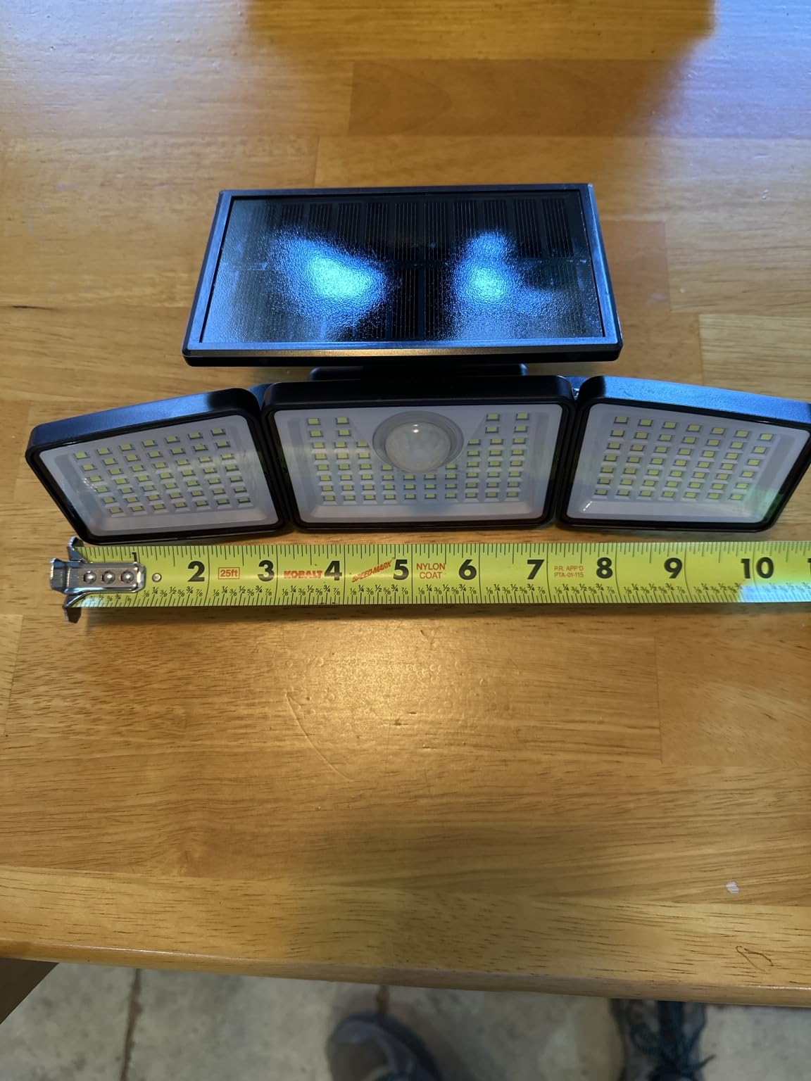 daphino 2500LM Solar Lights Outdoor with Motion Sensor, 3 Head 270° Wide Angle Street Area Lights, IP65 Waterproof Security Lighting with 3 Modes (2 Pcs) customer photo 1