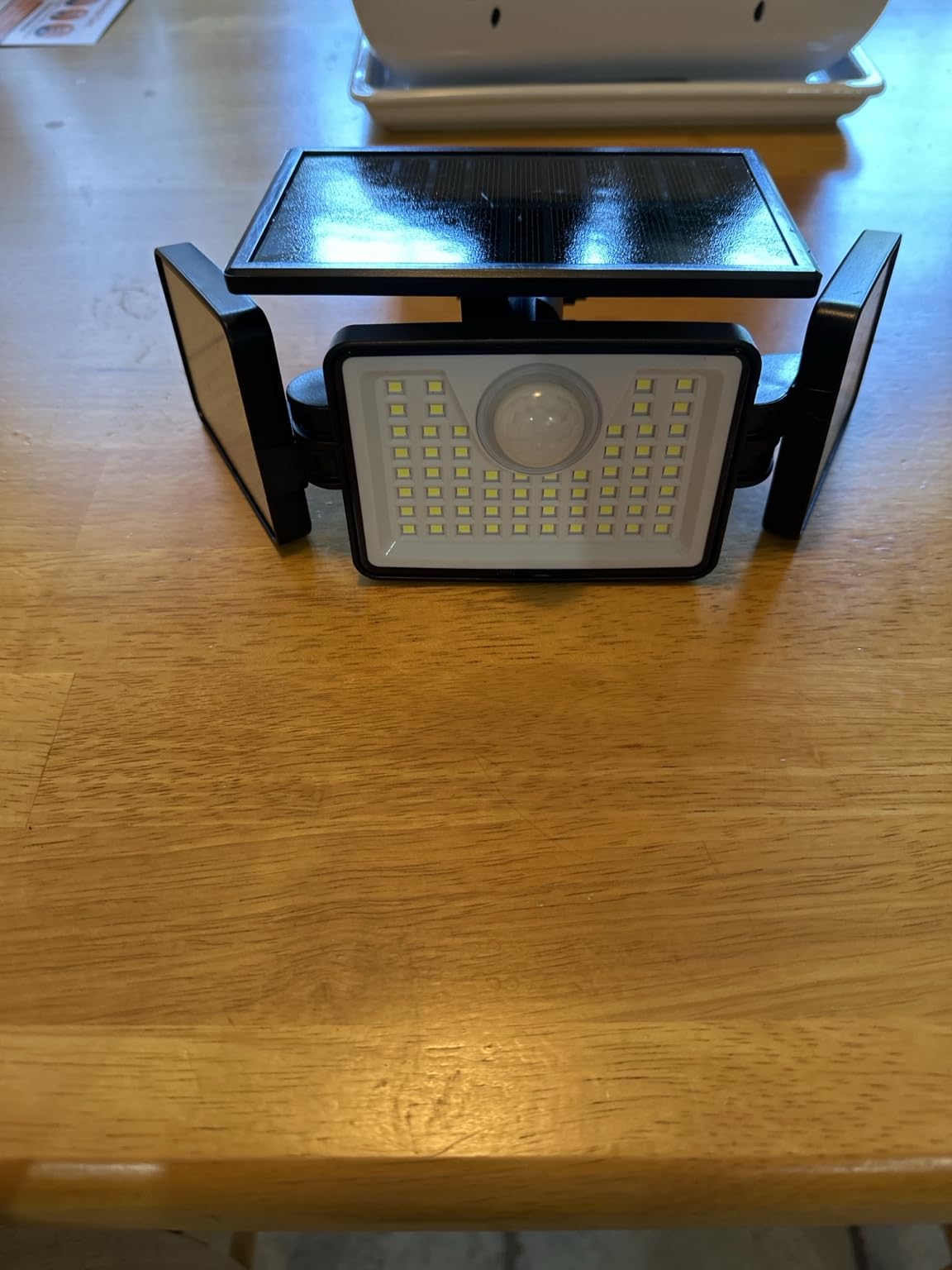 daphino 2500LM Solar Lights Outdoor with Motion Sensor, 3 Head 270° Wide Angle Street Area Lights, IP65 Waterproof Security Lighting with 3 Modes (2 Pcs) customer photo 2