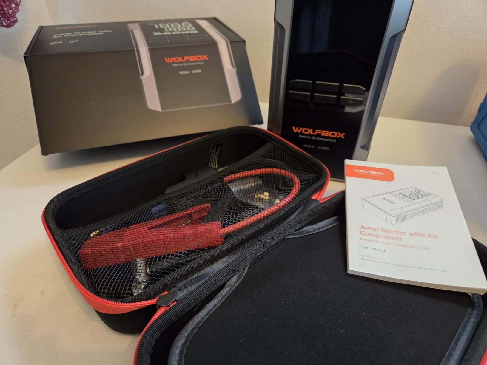 WOLFBOX 4000A Jump Starter with 160PSI Air Compressor, 12V Car Battery Booster, 88.8Wh Portable Jump Box (10.0 Gas/10.0L Diesel) with 65W Fast Charging, Tire Inflator, Jumper Cables, and LED Light customer photo 1