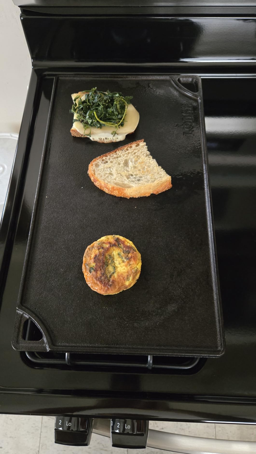 Lodge Reversible Cast Iron Grill/Griddle Pan 16.75 x 9.5 - Pre-Seasoned Dual-Sided Double Burner customer photo 1