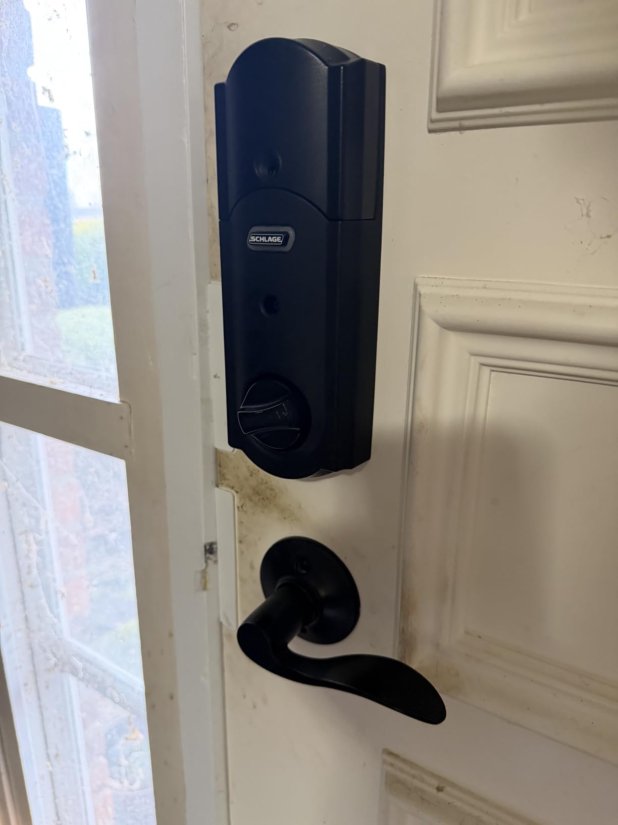 Schlage Century Entry Handleset, Left Hand Accent Lever, Matte Black | Exterior front door handleset grip with handed interior lever, No deadbolt, Pairs with smart locks customer photo 1