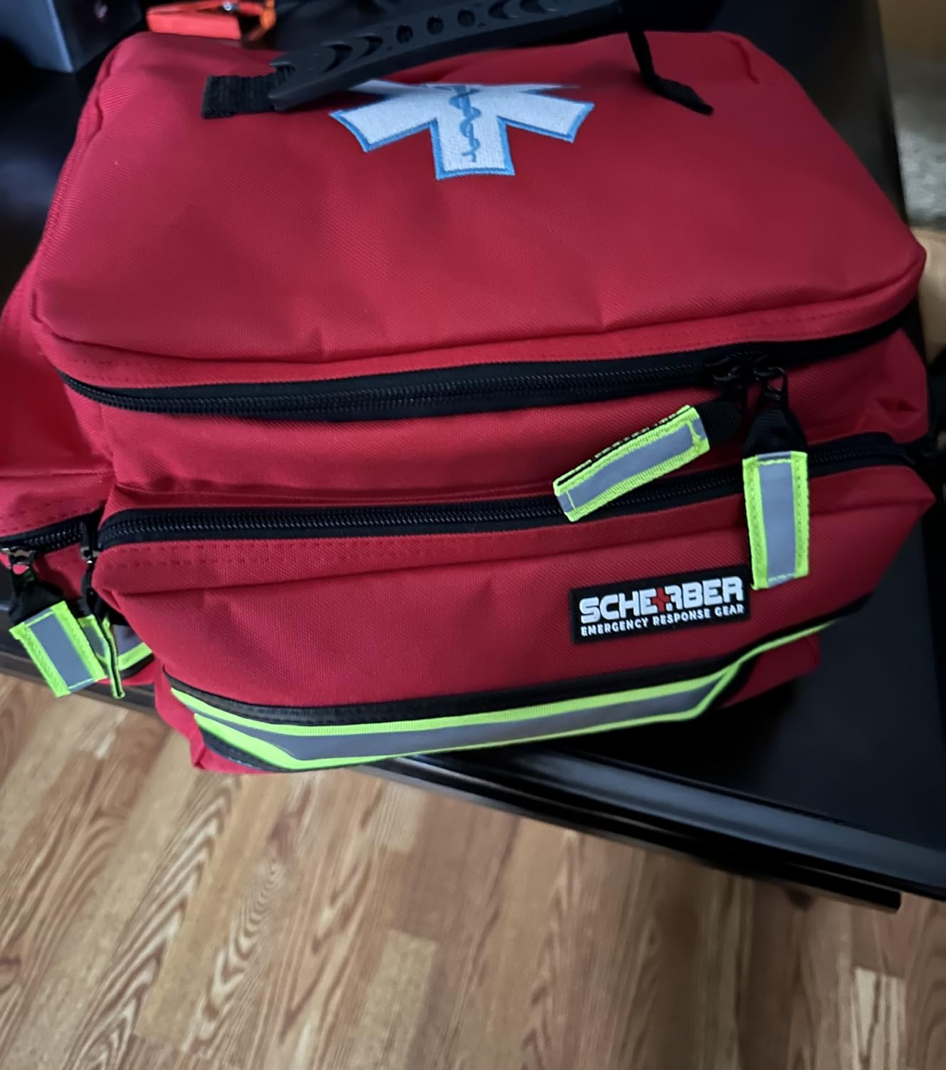 Scherber First Responder Fully-Stocked Professional Essentials EMT/EMS Trauma Kit | HSA/FSA Approved | Reflective Bag w/8 Zippered Pockets & Compartments & 200+ First Aid Supplies - Red customer photo 2