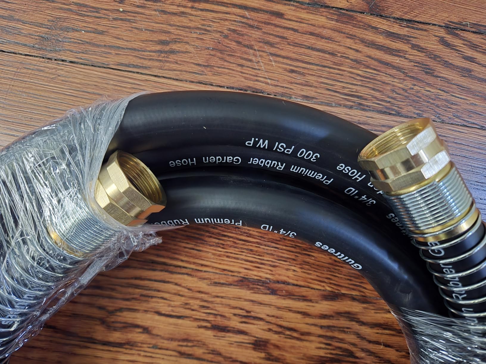 Guitrees 50FT 5/8 Heavy Duty Rubber Garden Hose - 300psi Working, 1000psi Burst - Hot/Cold Water - Five-Layered Braiding for Durability - Versatile for Gardening, Agriculture, Construction(Black) customer photo 1