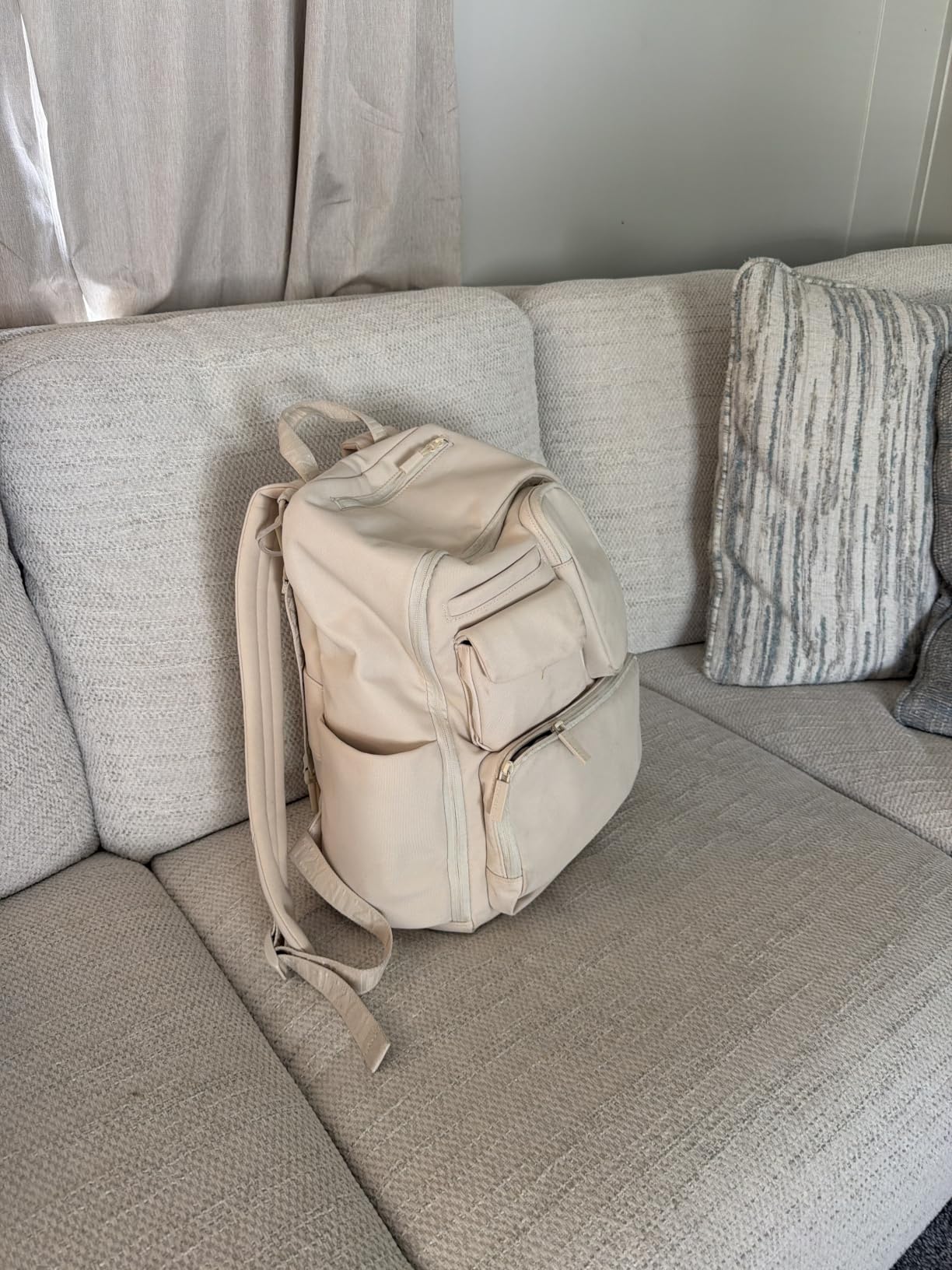 Itzy Ritzy Utility Diaper Bag Backpack - Features 17 Pockets (Including 2 Insulated Bottle Holders) & Trolley Sleeve and Includes Stroller Straps & Changing Pad - Part of the Belong Collection (Mocha) customer photo 1