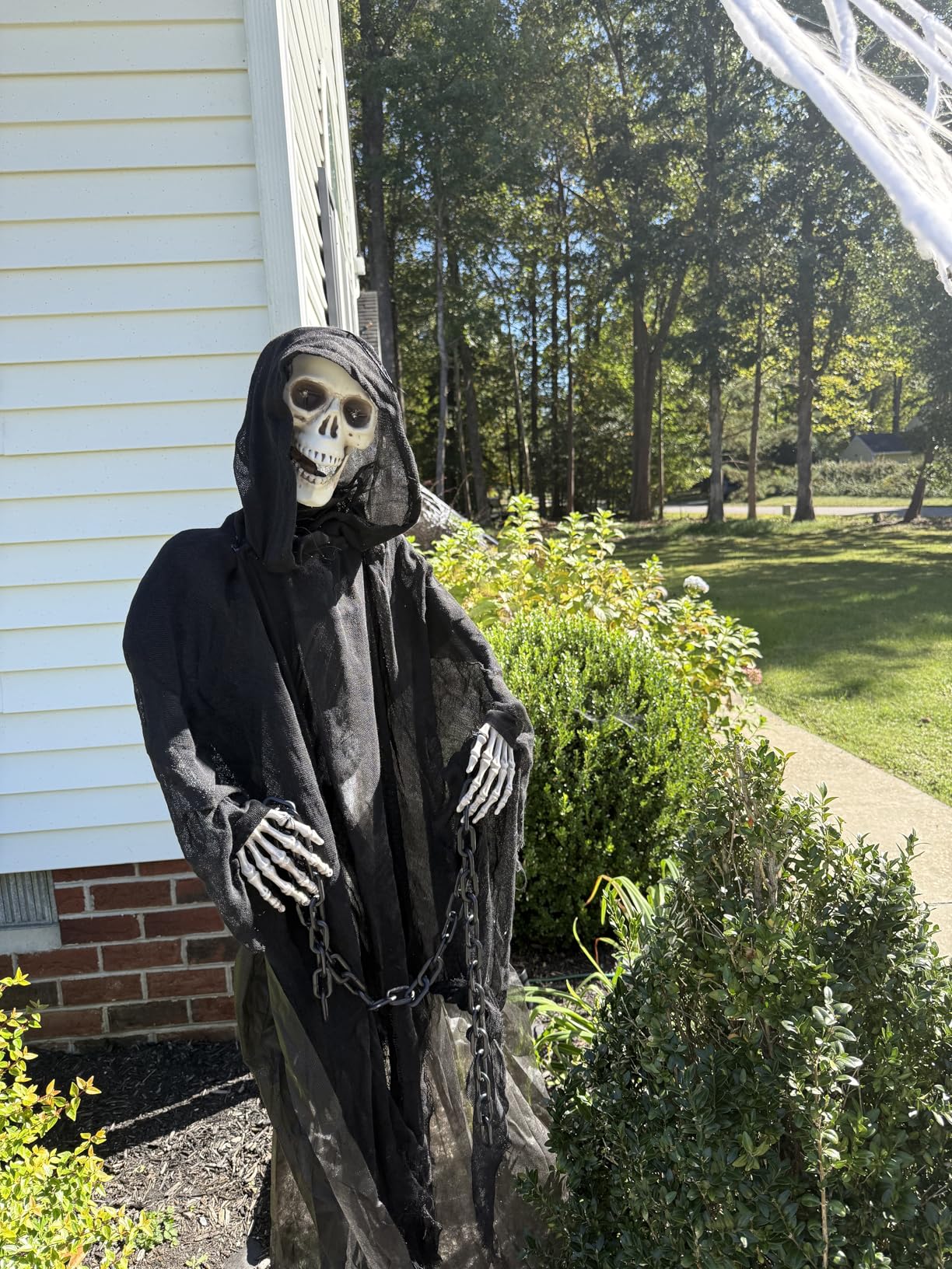 Haunted Hill Farm Life-Size Scary Grim Reaper with Chain, Halloween Animatronic with Touch Activated Lights and Sounds, 5.5-Ft customer photo 2