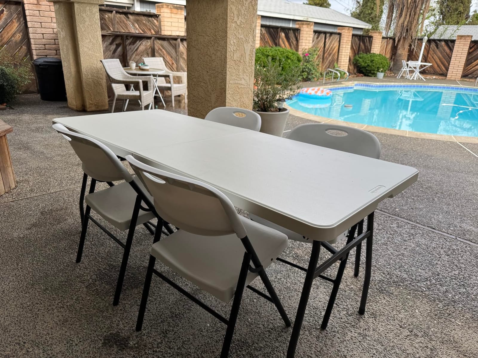 Amazon Basics Heavy Duty Portable Folding Table, 6 ft, Indoor & Outdoor, Fold-in-Half Design with Carrying Handle, White | Portable customer photo 1