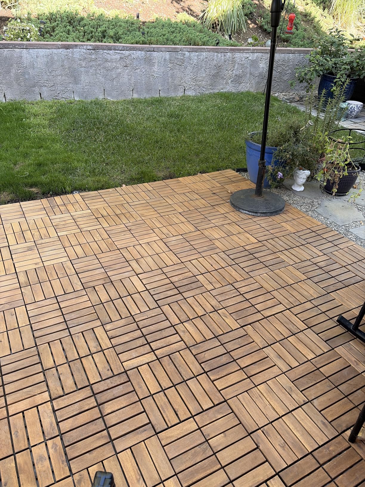 Yaheetech 108PCS Acacia Interlocking Deck Tiles Outdoor Patio Flooring, Wood | Slatted acacia wood tiles snap onto a PP base to cover concrete patios, porches, decks, and balconies in a natural finish. customer photo 2