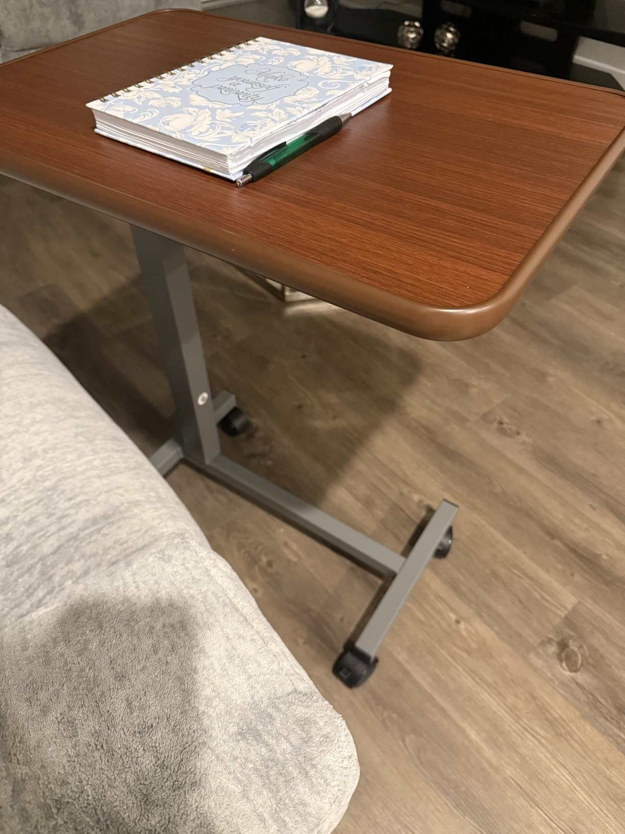 WOTURE Pneumatic Adjustable Overbed Bedside Table with Wheels - Hospital & Home Use, Medical Bed Table, Mobile Standing Desk, Rolling Laptop Cart, Non Tilt Surface (Walnut) customer photo 1