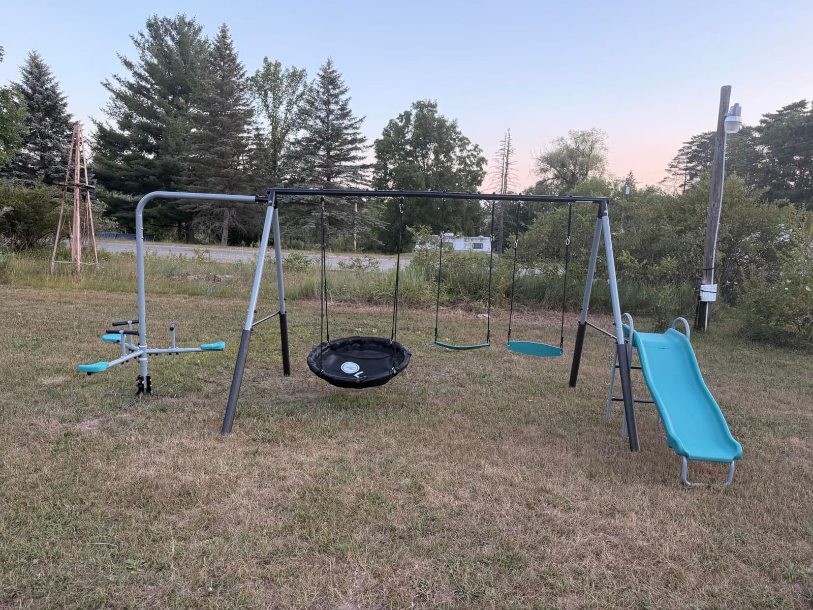 Lark Water Slide Swing Set with 6 Ft Water Tarp, Disc Swing, 2 Sling Swings, 3-Seat Merry Go Round with Adjustable Heavy Duty Ropes, 16-Gauge Weather Resistant Steel Frame (Madison) customer photo 1