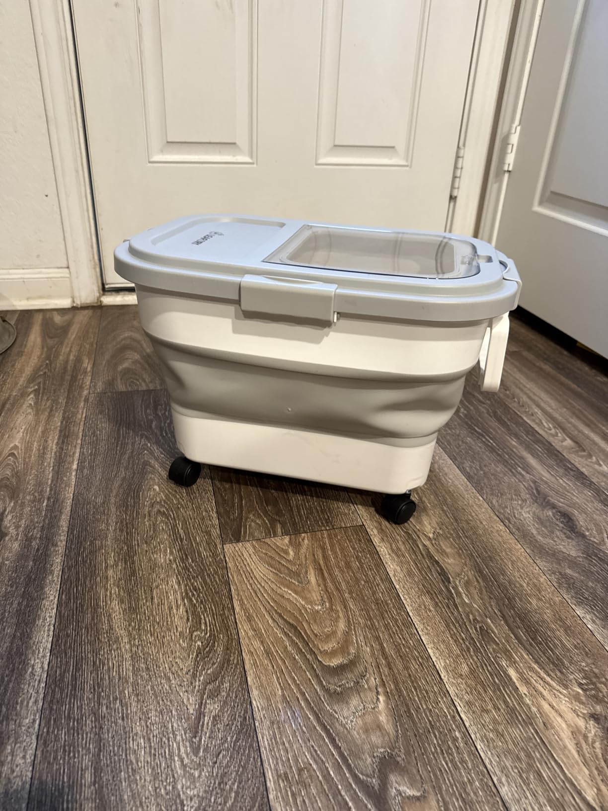 Wood Pellet Storage Container 20-25lbs, Wheeled Bin with Clear Window | Collapsible Pellet Bucket with Secure Locking Lid, Scoop and Labels Included, Gray customer photo 1