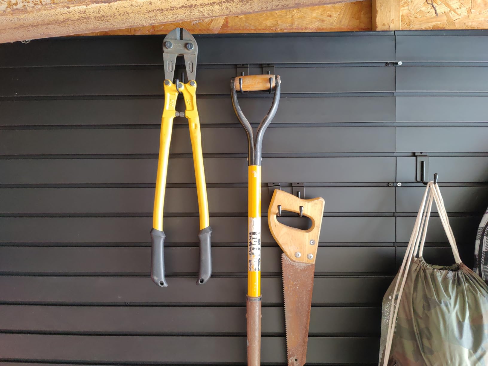 Yuzzy Slat Wall Paneling 4 x 8ft, Garage Slatwall Panel Wall Storage Systems, Heavy Duty PVC Garage Wall Organization (Black) customer photo 1