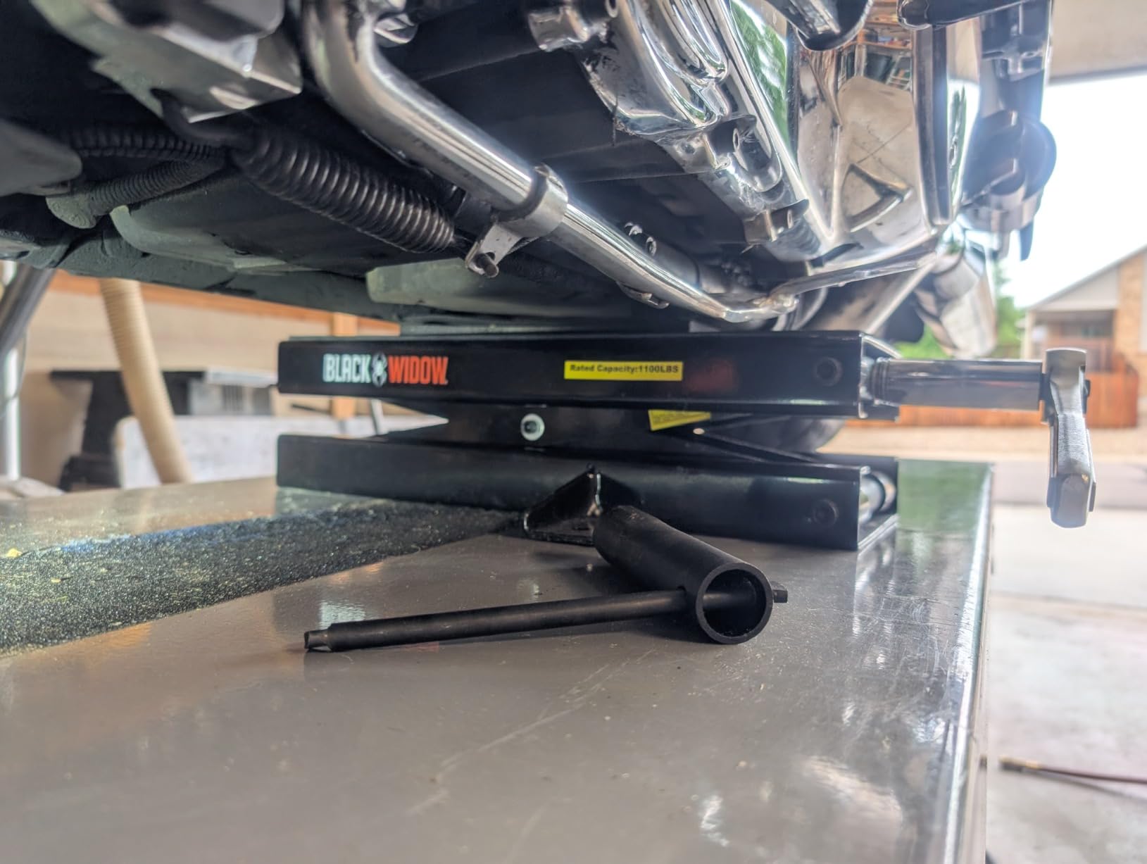 Black Widow Steel Motorcycle Tire Jack, 3.75 to 16.25 In Lift, 1,100 lb | Lifts the Front or Rear Tire 3.75 to 16.25 In with a Hex Socket Handle, Steel Build for Tire, Brake and Chain Service customer photo 2
