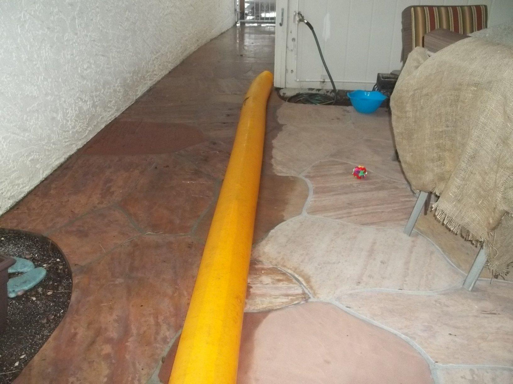 The Original HydraBarrier Standard Flood Barrier – 24 ft Long x 4 in High – Light, Reusable Sandbag Alternative – Flood Control & Diversion Tube for Home, Garage, Door & Property Protection customer photo 1