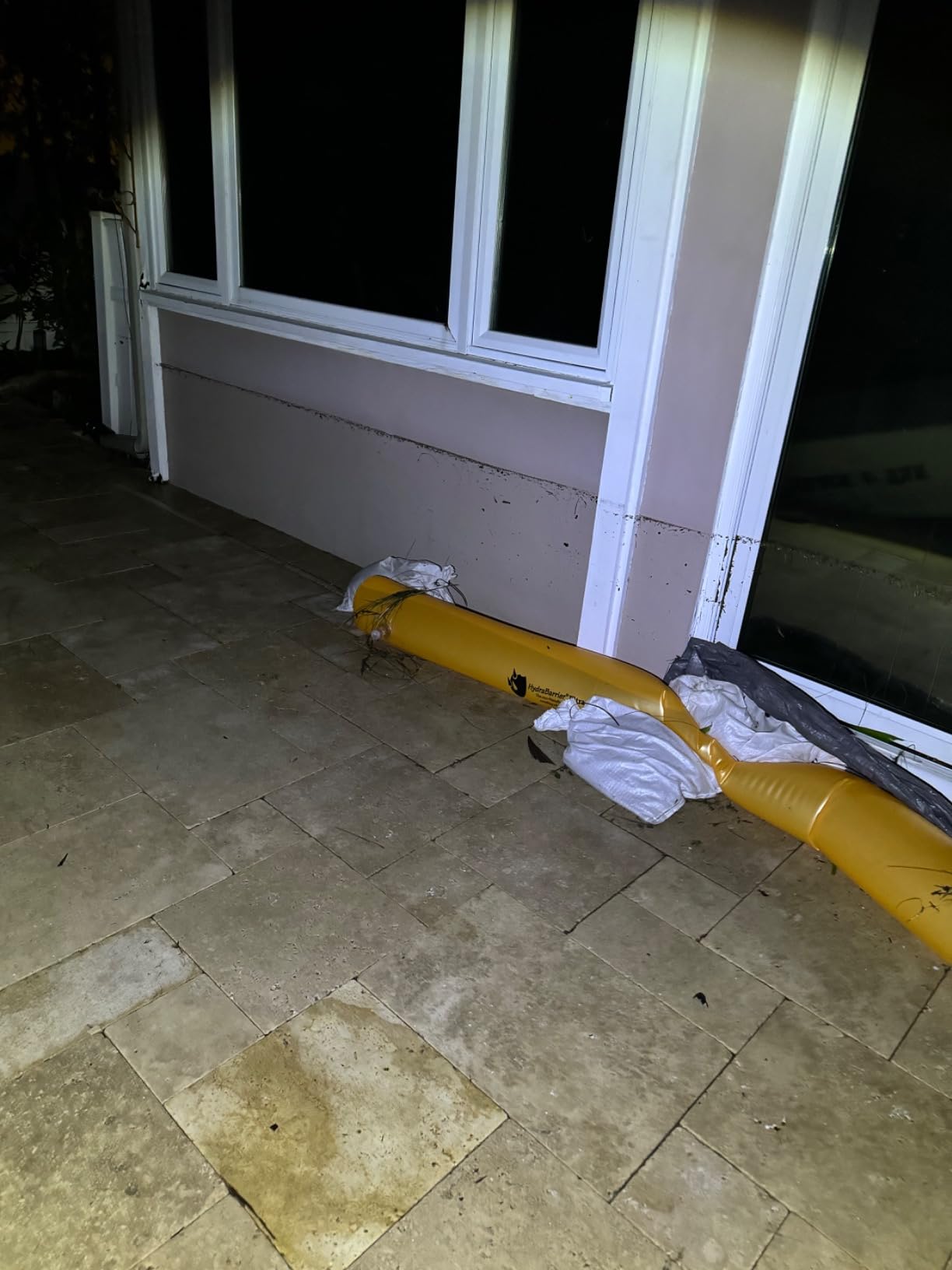 The Original HydraBarrier Ultra Flood Barrier – 12 ft Long x 6 in High – Light, Reusable Sandbag Alternative – Flood Control & Diversion Tube for Home, Garage, Door & Property Protection customer photo 2