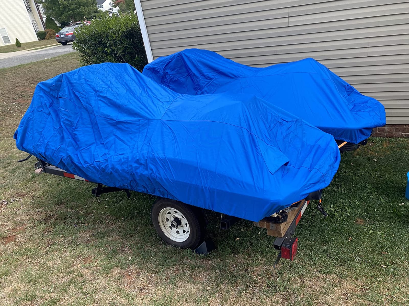 Budge Waterproof Trailerable Jet Ski Cover, Fits 121-135 in PWCs | Waterproof, UV-resistant PWC cover protects against sun, rain, dust & sap; Trailerable; Fits 121-135