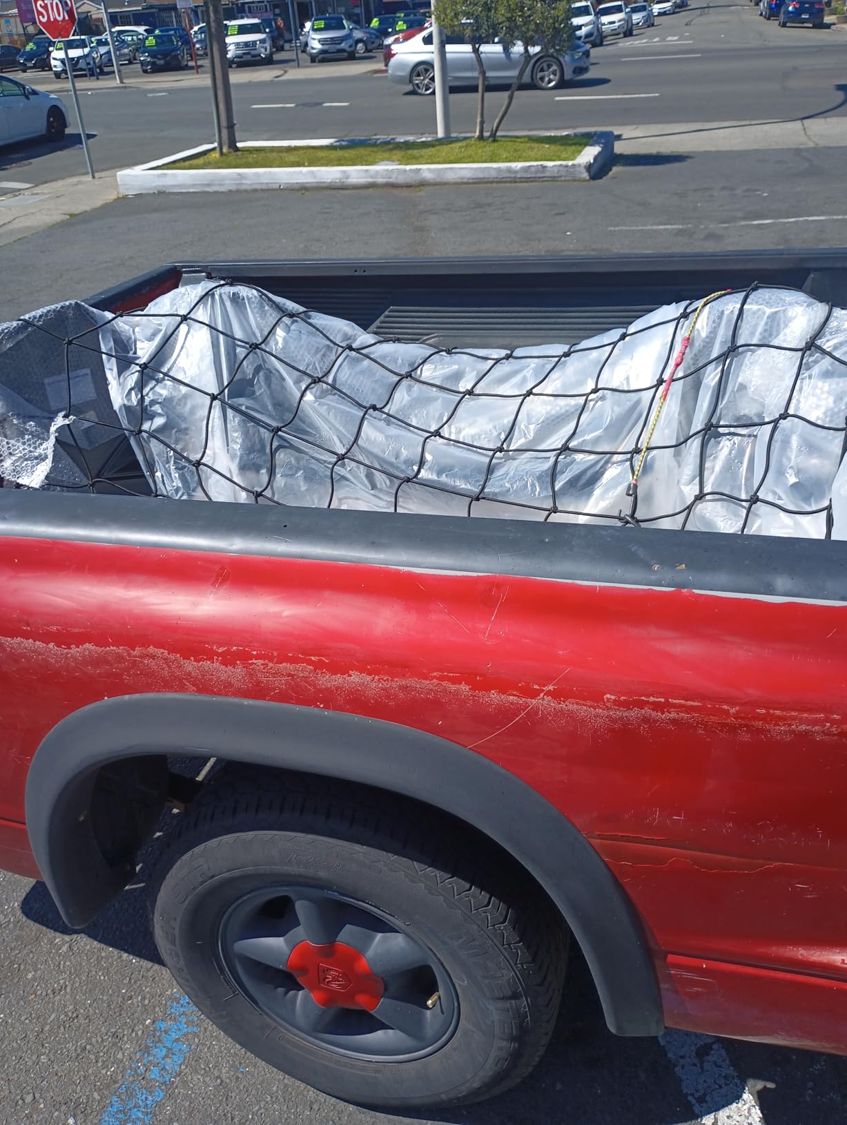Seven Sparta Large Cargo Net for Truck Bed 5'x 7' Stretches to 10' x 14' | Latex, Large Size, With 16 D Clip Carabiners customer photo 1