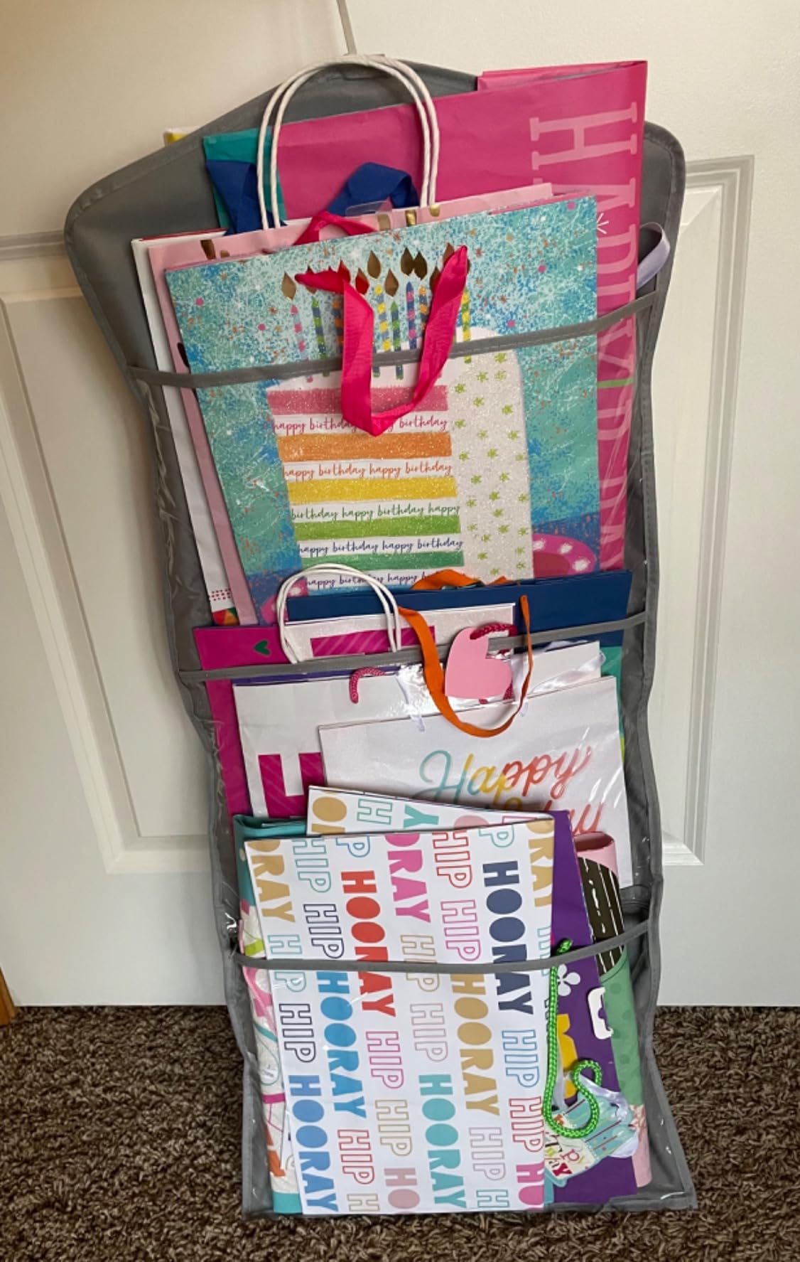 ProPik Hanging Double Sided Gift Bag Storage Organizer with Multiple Front and Back Pockets - Organize Your Gift Wrap, Tissue Paper, and Paper Bags 38 x 16 Inch PVC (White) customer photo 1