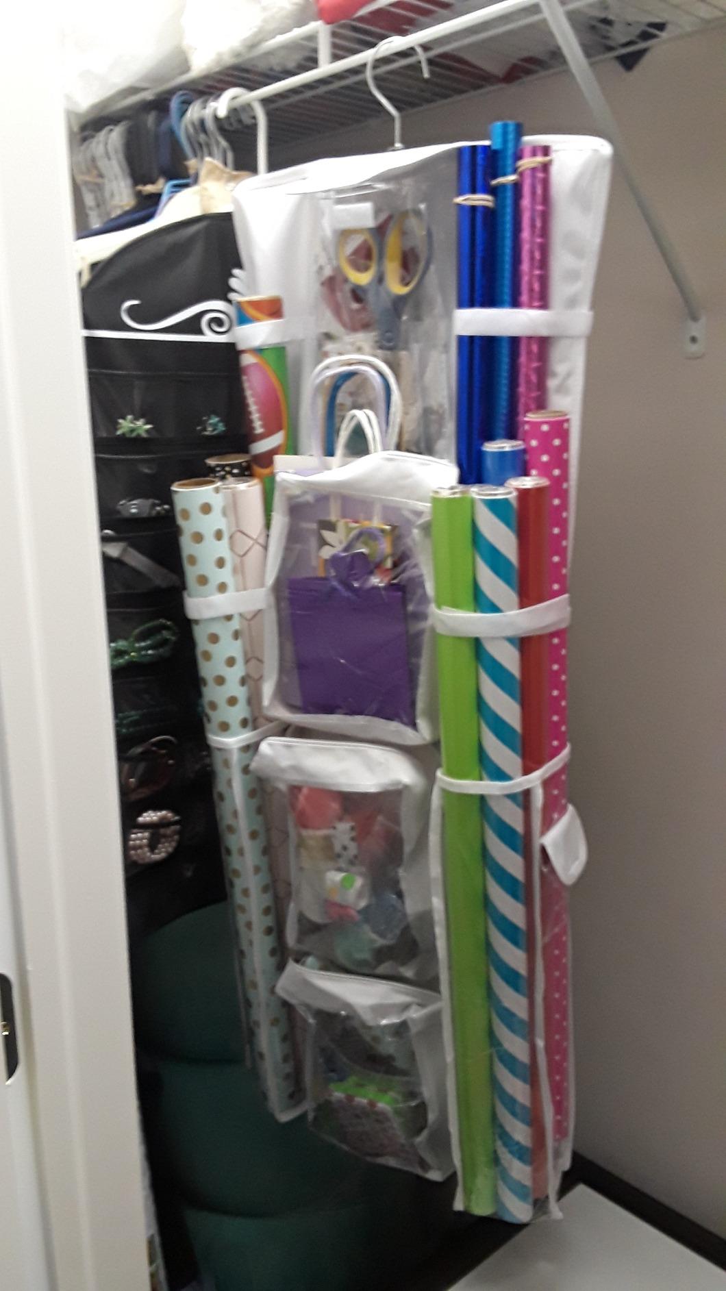 Freegrace Hanging Gift Wrap Organizer - Wrapping Paper Storage Bag, 41 Inch | Double-sided closet storage | 16 x 41 in | Holds 12 40-in rolls | Gift bags & ribbons | 600D Oxford | 360° hanger customer photo 1