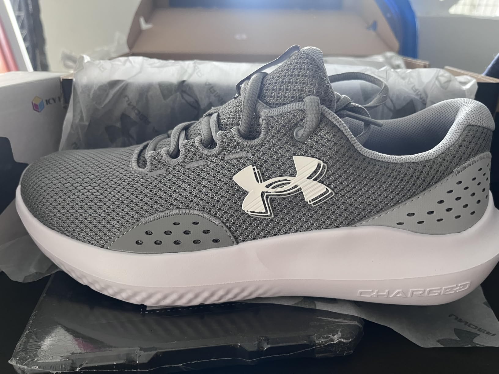 Under Armour Men's Charged Surge 4 Sneaker customer photo 1