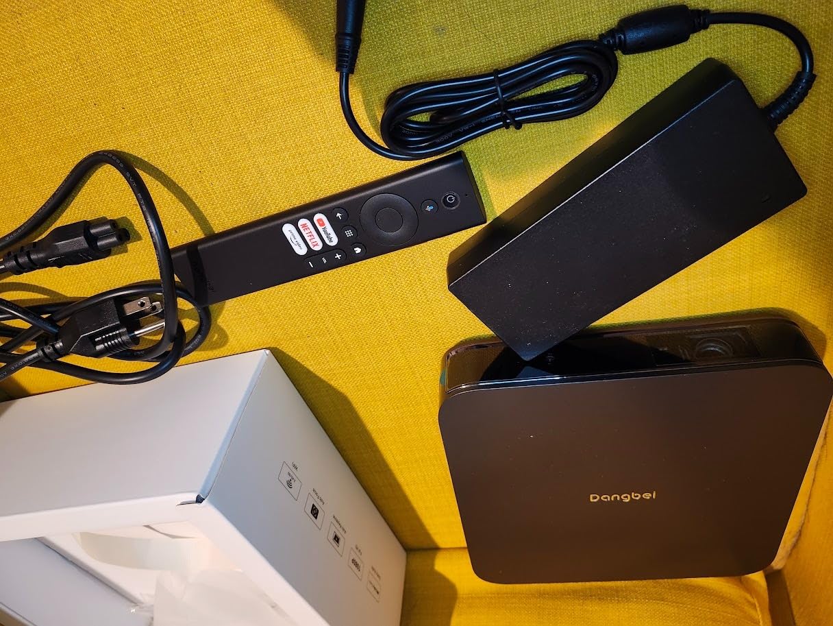 Dangbei Atom Portable Laser Projector, Google TV with Official Netflix, 1200 ISO Lumens, 180