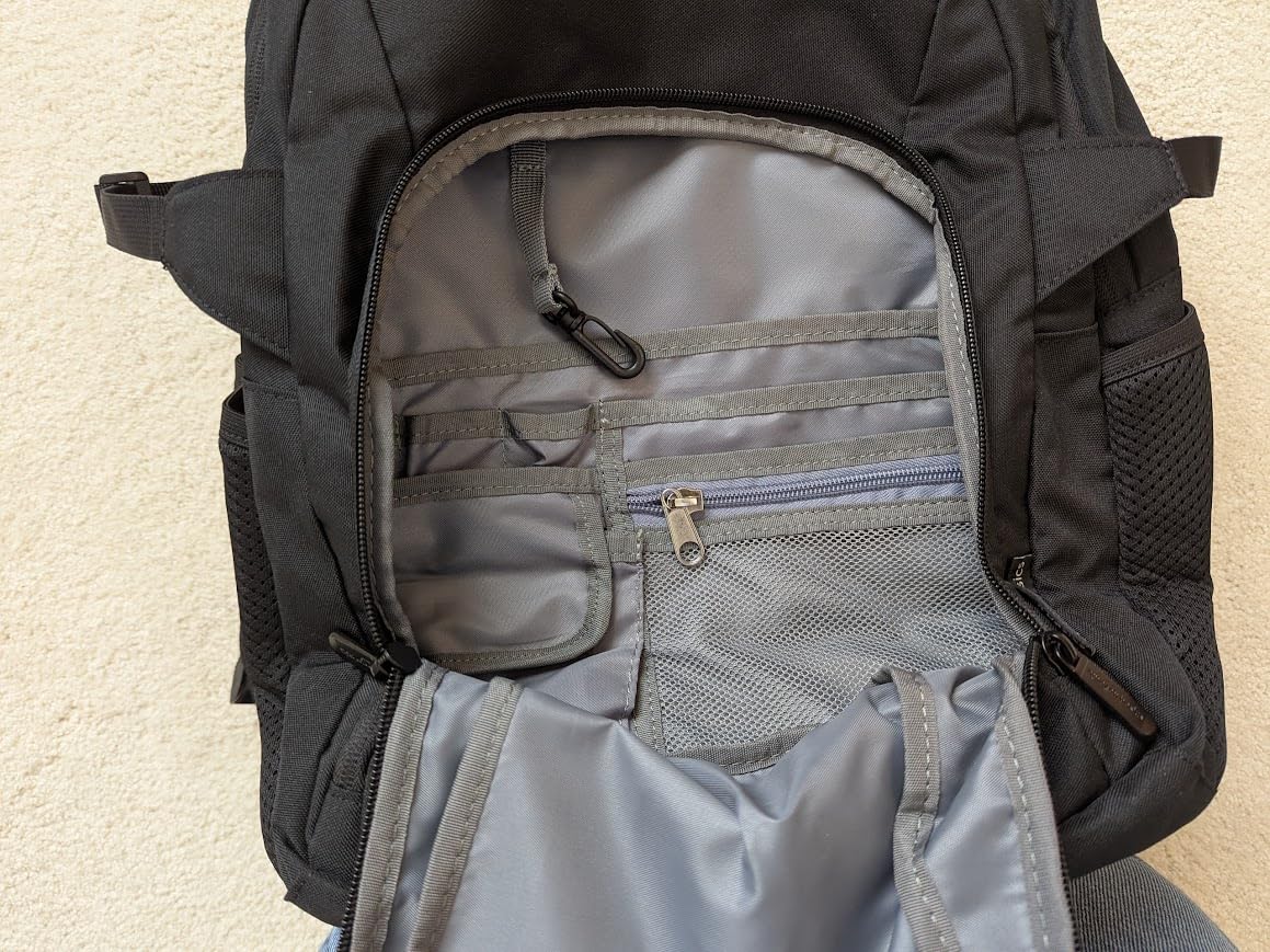 Amazon Basics Travel Laptop Backpack with Multiple Pockets and Compartments for 17 in / 43.1 cm Laptop, Water Resistant, Spacious with Padded Shoulder Straps, Black customer photo 1