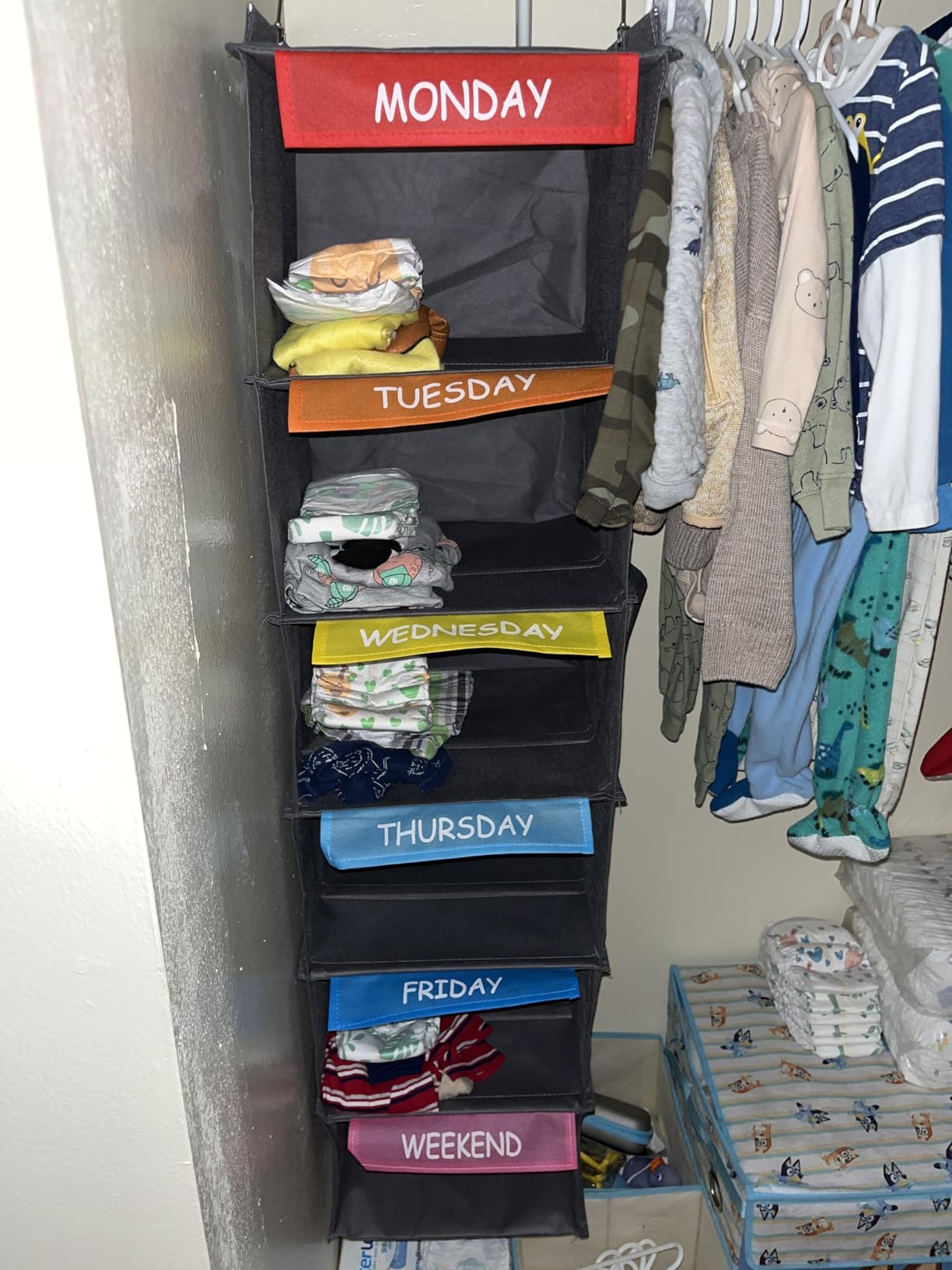 Hanging Closet Organizer 6-Shelf Kids Clothing with Day Labels | Features Monday-Friday weekday and weekend labeled shelves to simplify children's daily outfit planning. Available in grey. customer photo 1