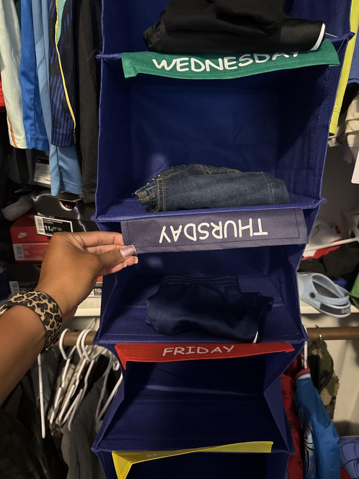 Hanging Closet Organizer 6-Shelf Kids Clothing with Day Labels | Features Monday-Friday weekday and weekend labeled shelves to simplify children's daily outfit planning. Available in grey. customer photo 2