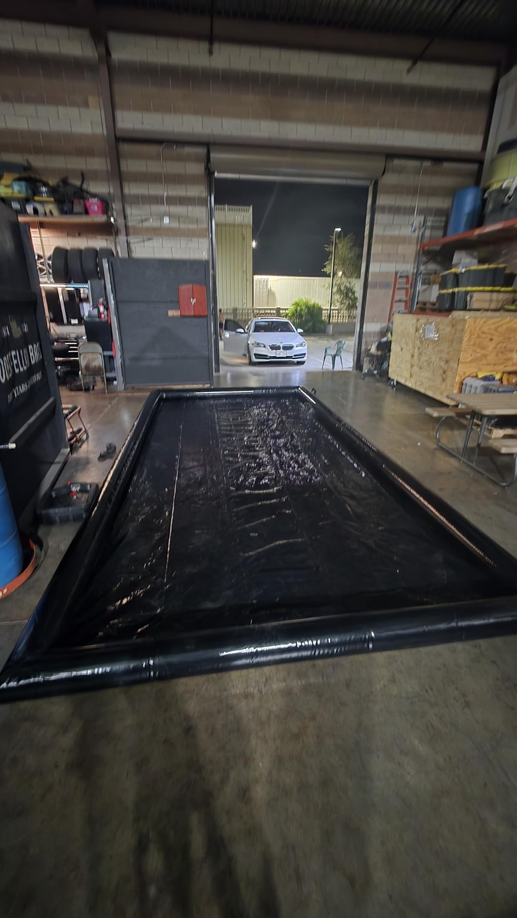 Inflatable PVC Garage Floor Mat for Car Washing, 9.7 x 19.5 ft | PVC mat, 7.8 in sealed edges, non-slip surface, inflates in under 1 minute, for washing and maintenance customer photo 2