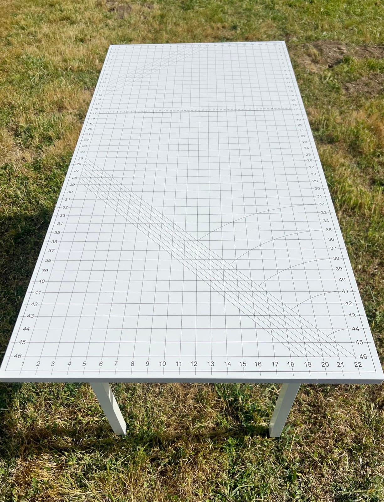 Crutello Folding Sewing & Craft Table, 42x24 Inch - Grid Top with Storage | Steel Folding Storage Legs, Drop-Down Sewing Machine Platform, For Fabric Cutting, Quilting & Crafts customer photo 1