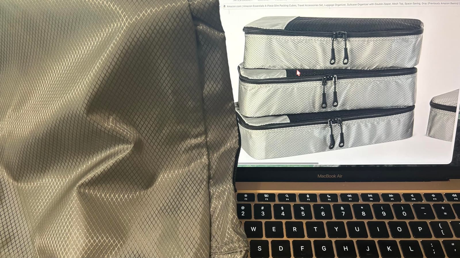 Amazon Essentials 4-Piece Space-Saving Packing Cubes Travel Accessories Set, Luggage Organizer with Double Zipper, Mesh Top, Small, Black (Previously Amazon Basics) customer photo 1