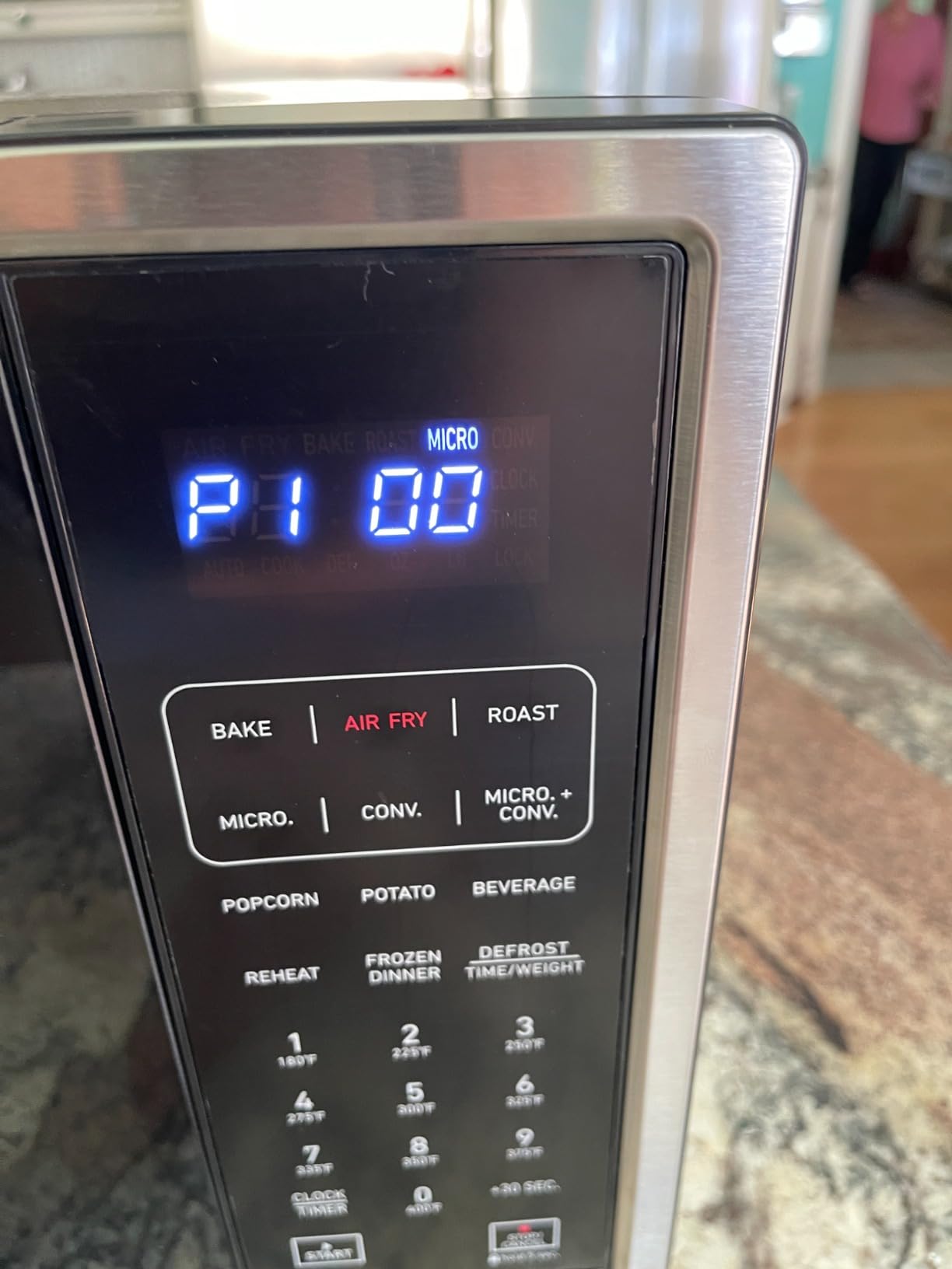 West Bend 3-in-1 Microwave Air Fryer Convection Oven 1000-Watts with 10 Power Levels and 12 Presets, Speed Defrost, Electronic Control Panel and Glass Turntable, 1.3-Cu.Ft., Stainless Steel customer photo 2